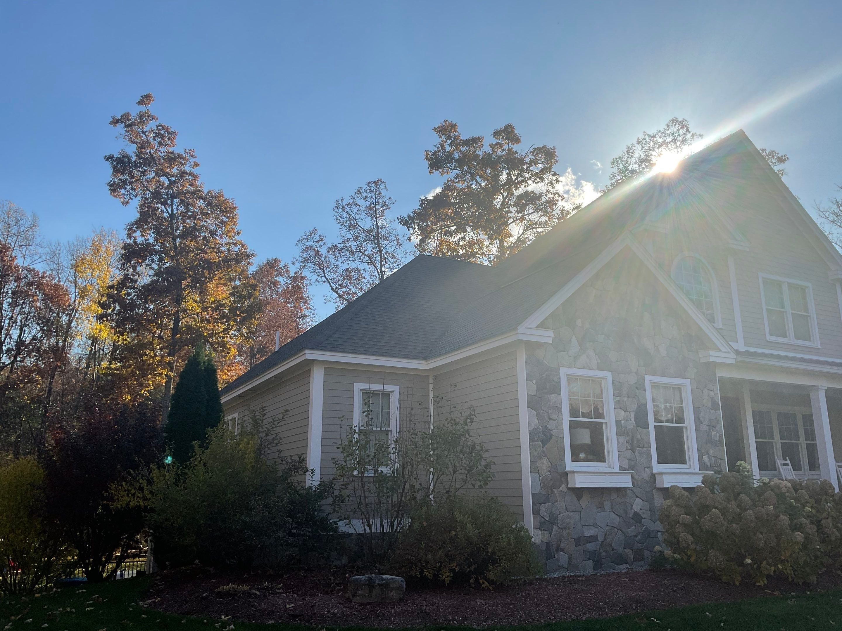 the service being done is cleaning the exterior surfaces of the house including windows and stonework
