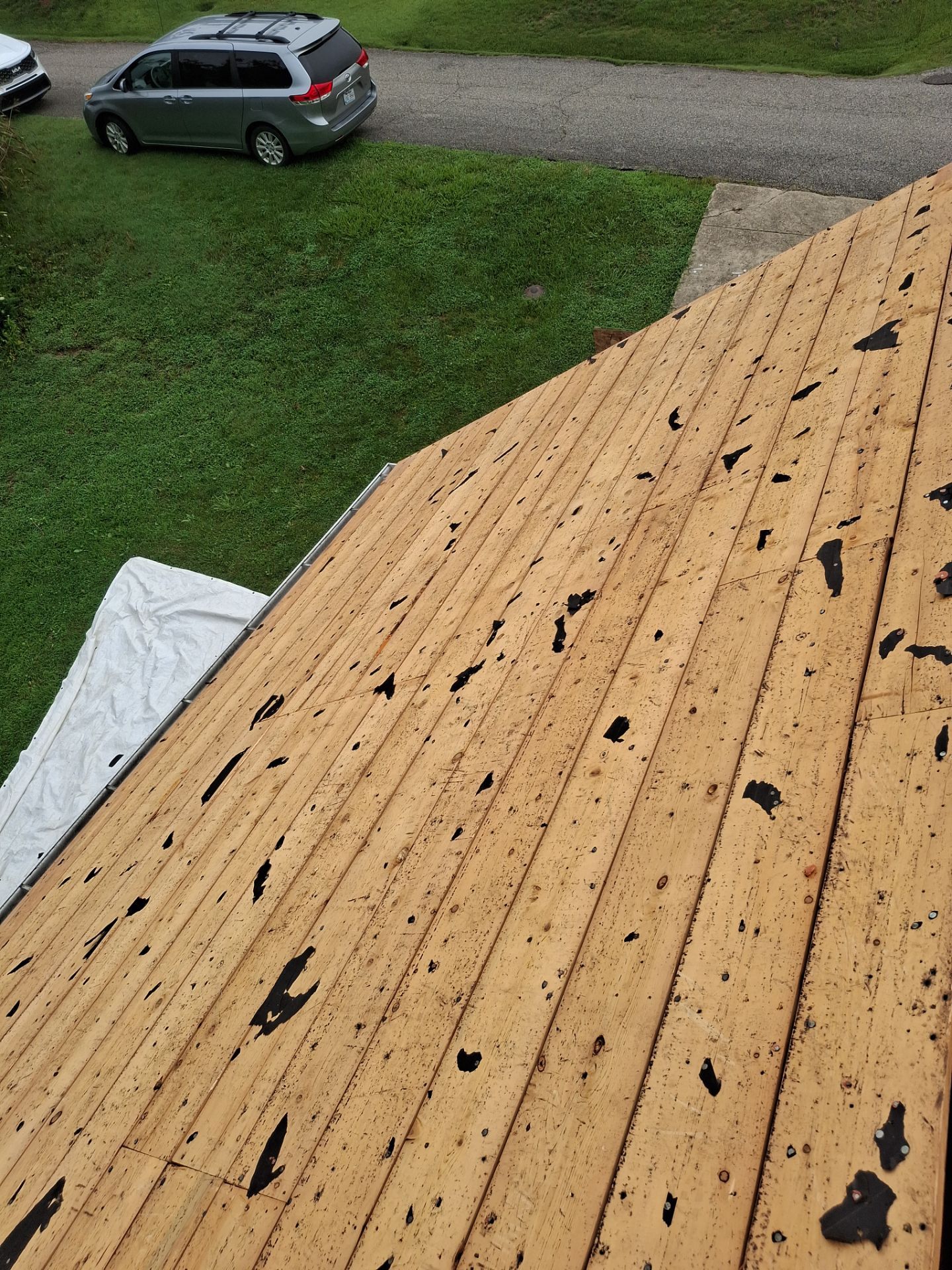 Residential Roofing Installation using GAF Timberline HDZ Charcoal by Rainstoppers Roofing