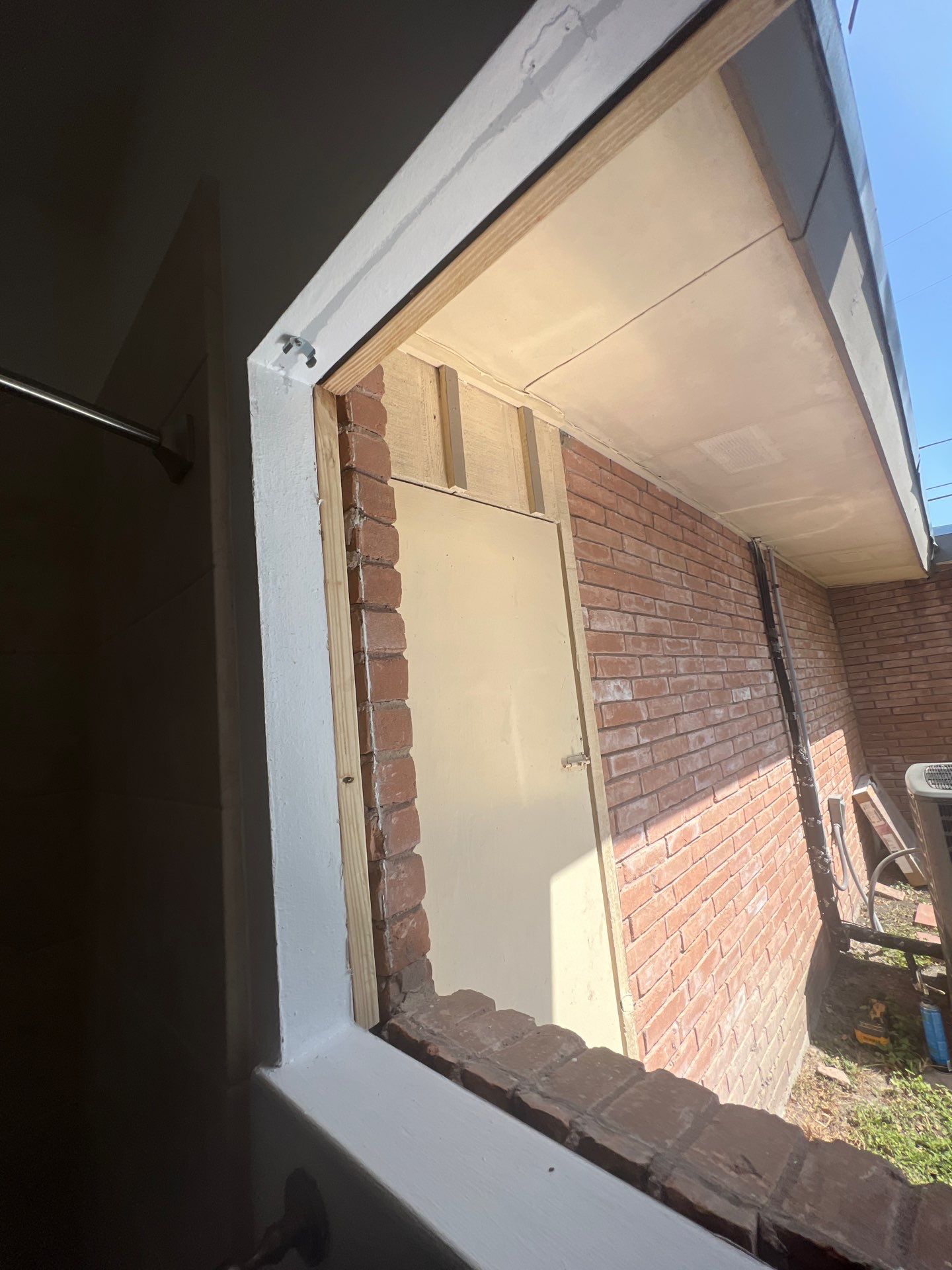 Windows in Brick with a Bay Window by Bayfront Roofing and Construction