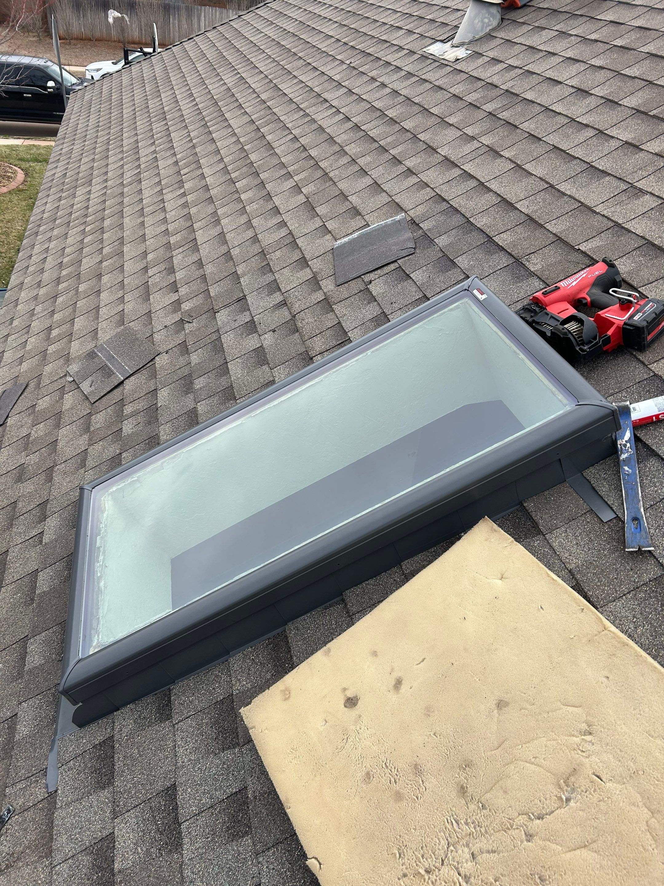 Roof Replacement & Skylight Project in Edmond, OK by McCann's Roofing and Construction