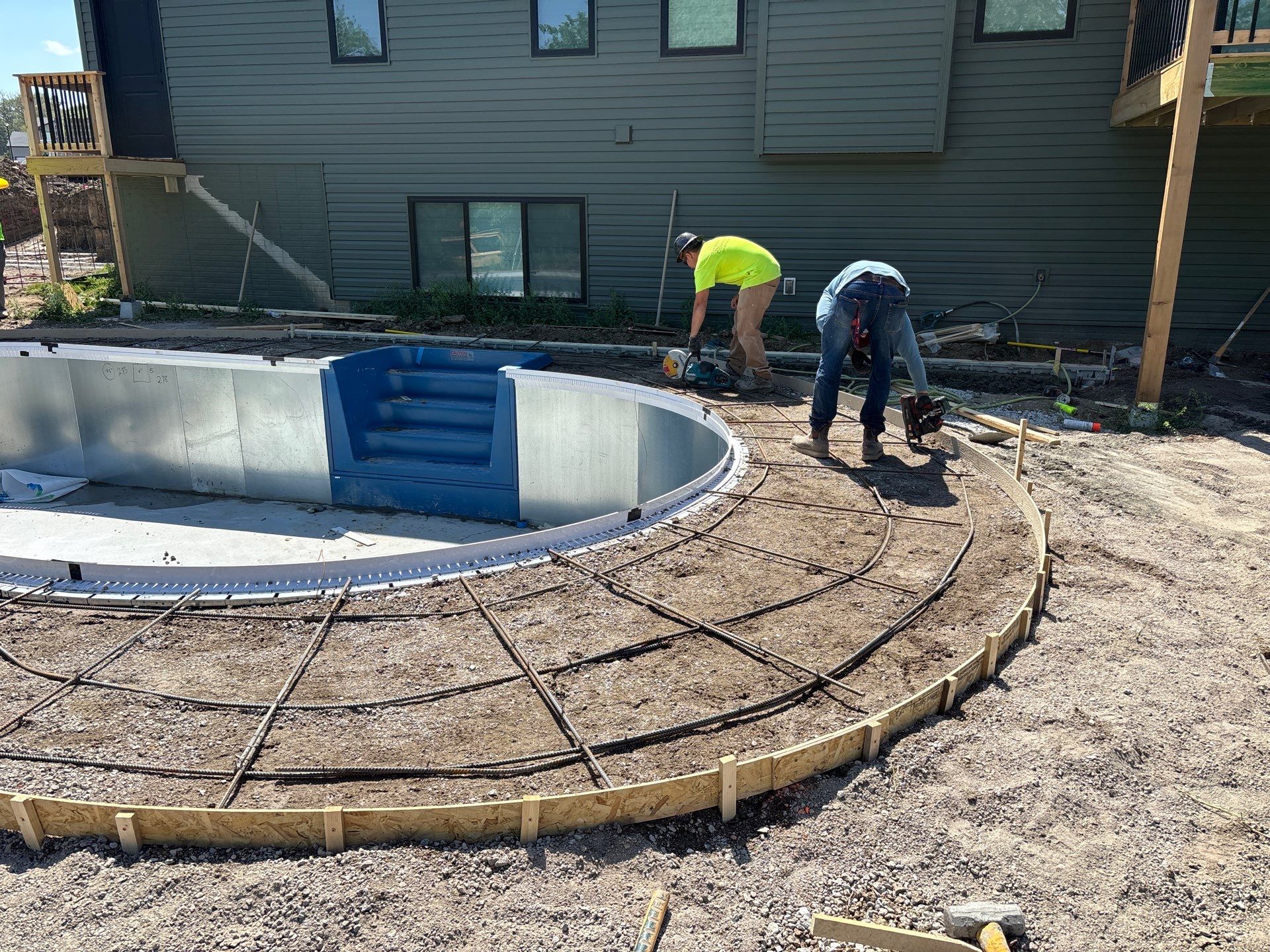 New Residential Construction - Paver, Putting Green, Pool by New Horizon Landscapes