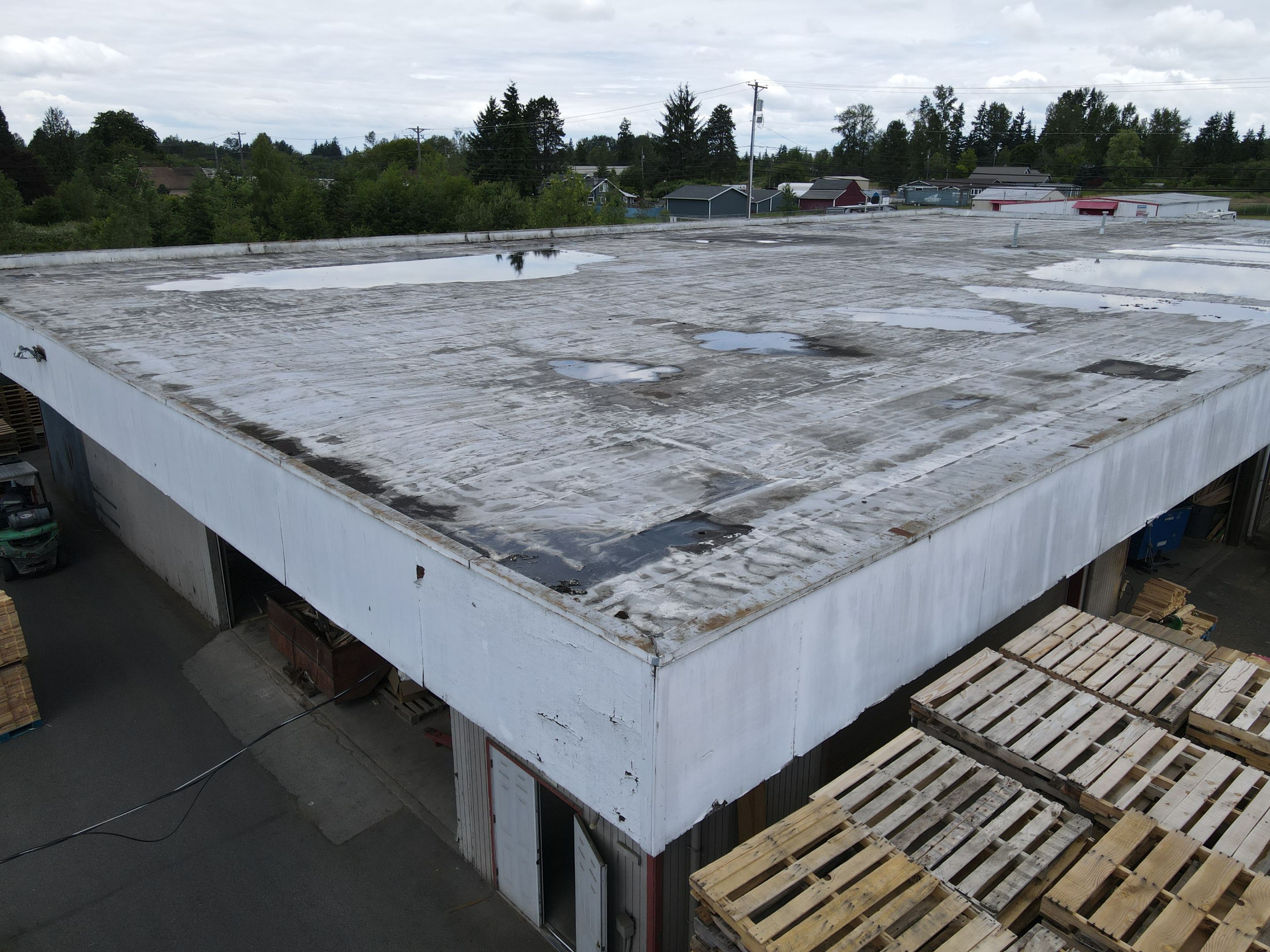 Warehouse Flat Roof - Torchdown to PVC by Roof Smart