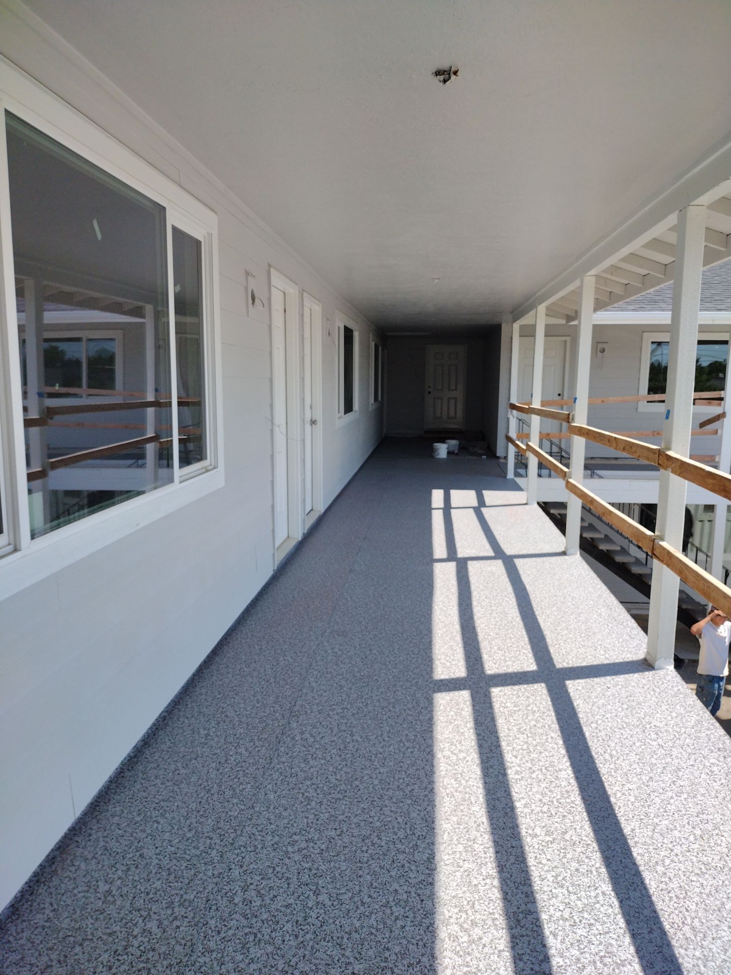 Dec-Tec Walkable Membrane using Dec-Tec (Color: Granite) by Orezona Building & Roofing Company, Inc.