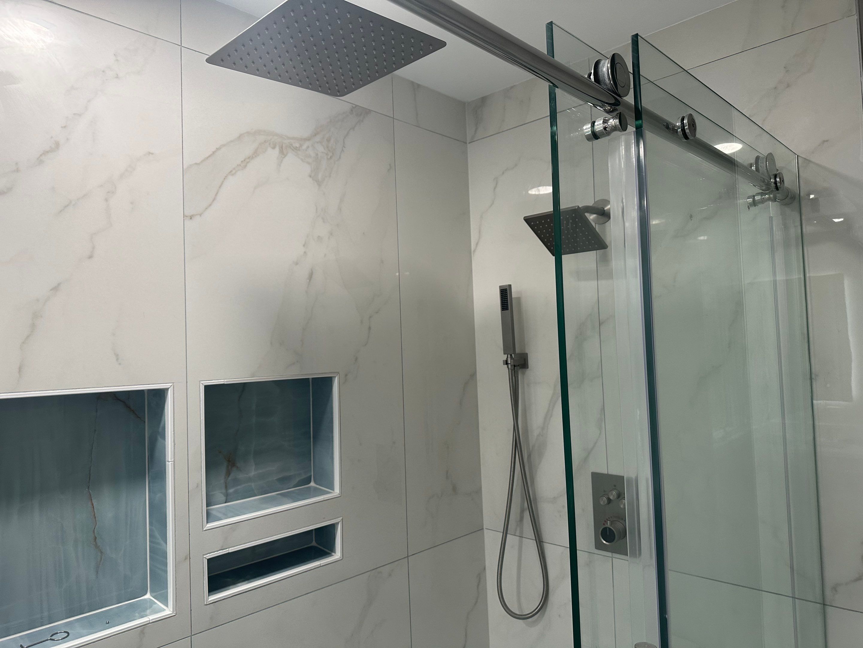 Bathroom Remodel using Tile by Home Concepts Construction