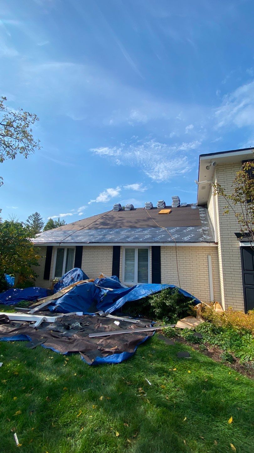 Asphalt Roof Replacement by Custom Installations