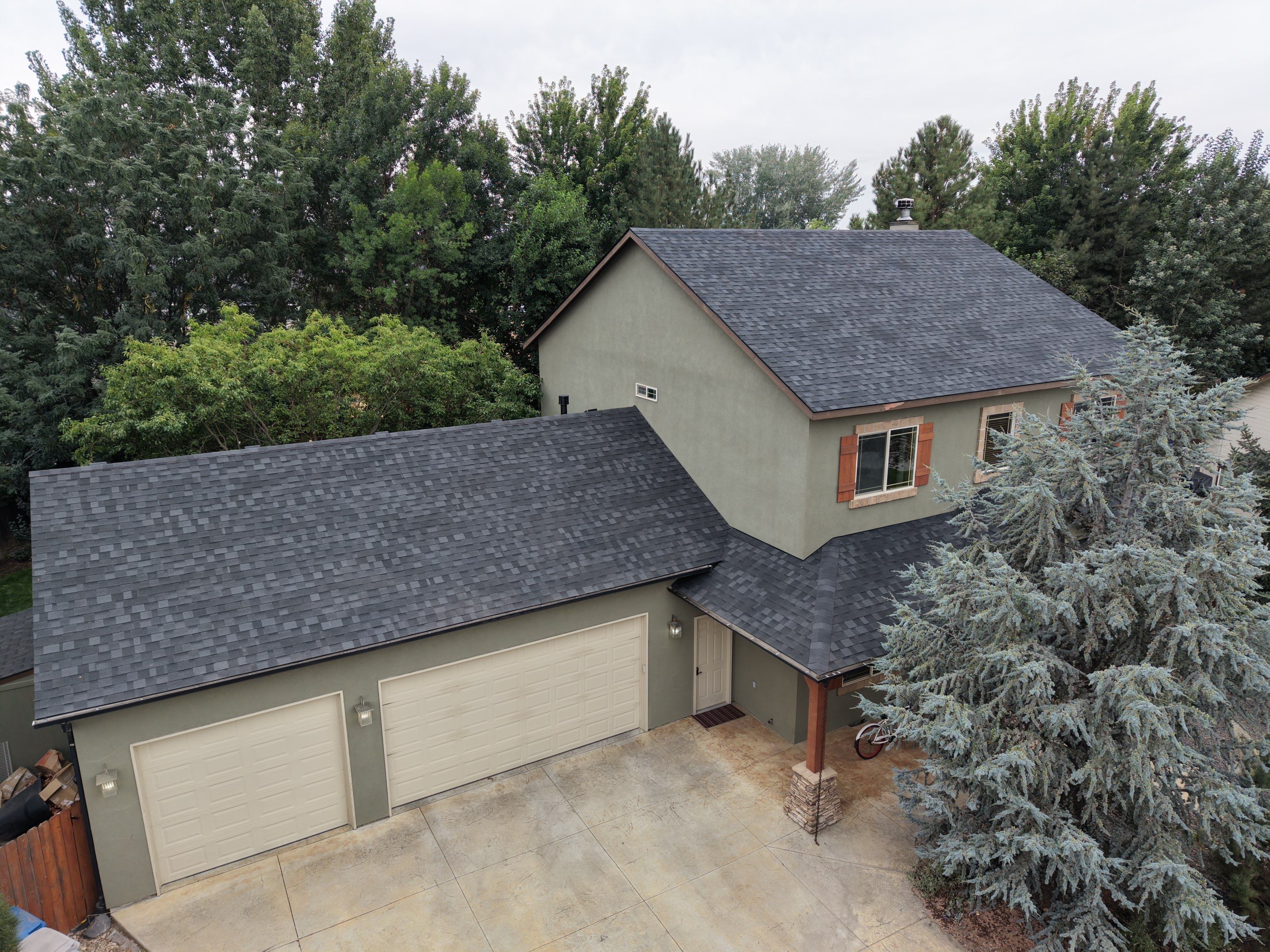 Residential Roof Replacement for Two-Story Stucco Home in Star by Olive Roofing