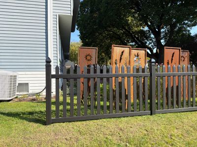 Black Vinyl Spaced Picket Fence Installation in Cedar Falls