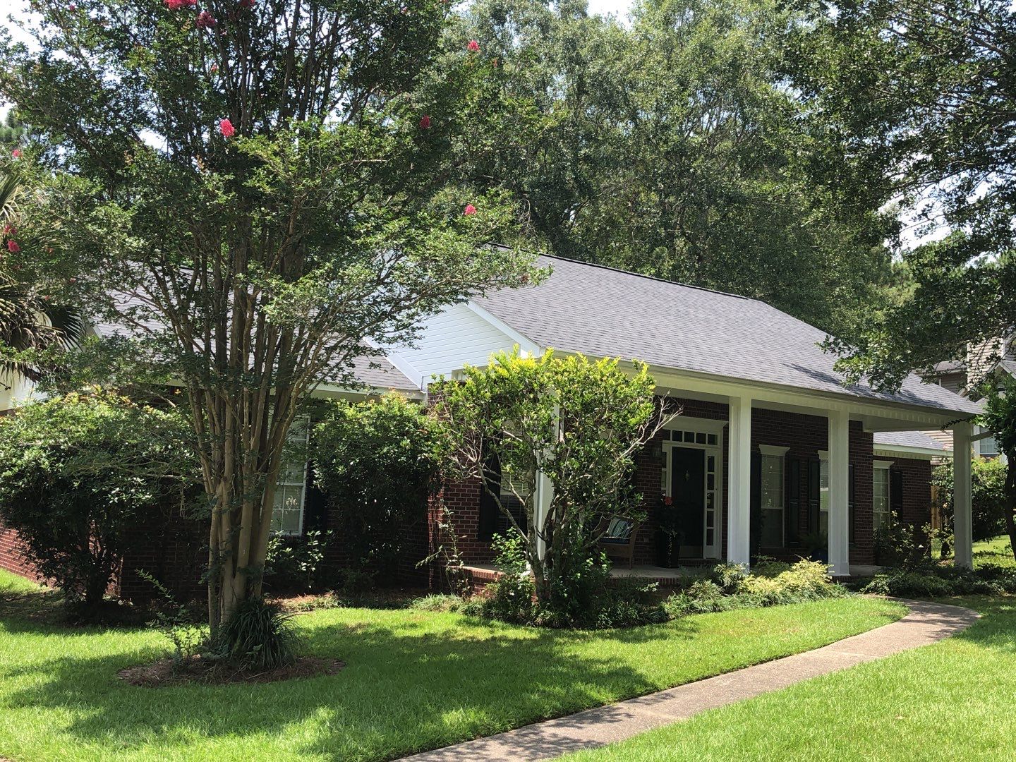 Residential Roofing Installation using Roof Replacement by American Roofing & Construction LLC