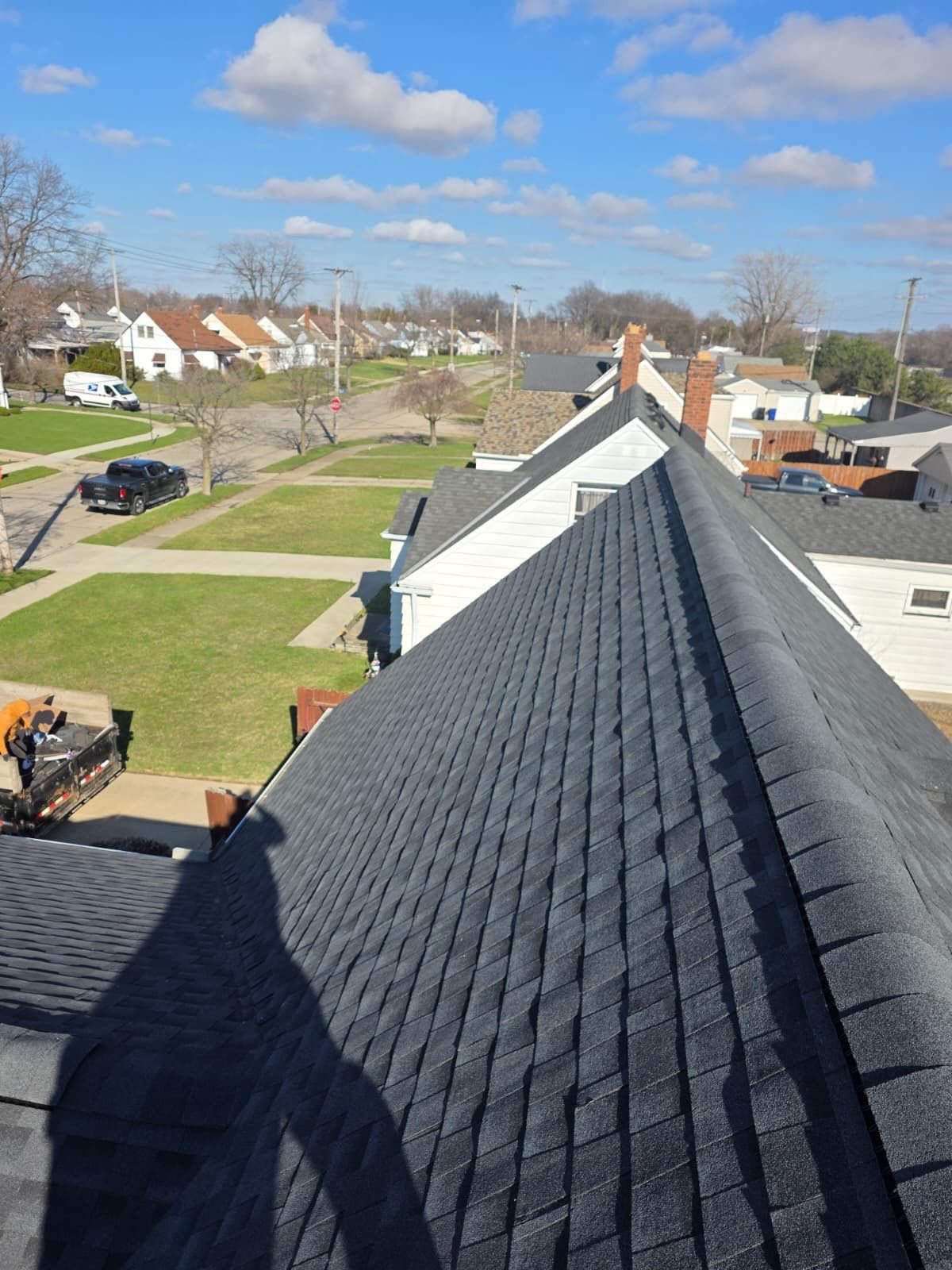 Cleveland Roof replacement - Charcoal shingles by Atlas Roofing & Restoration