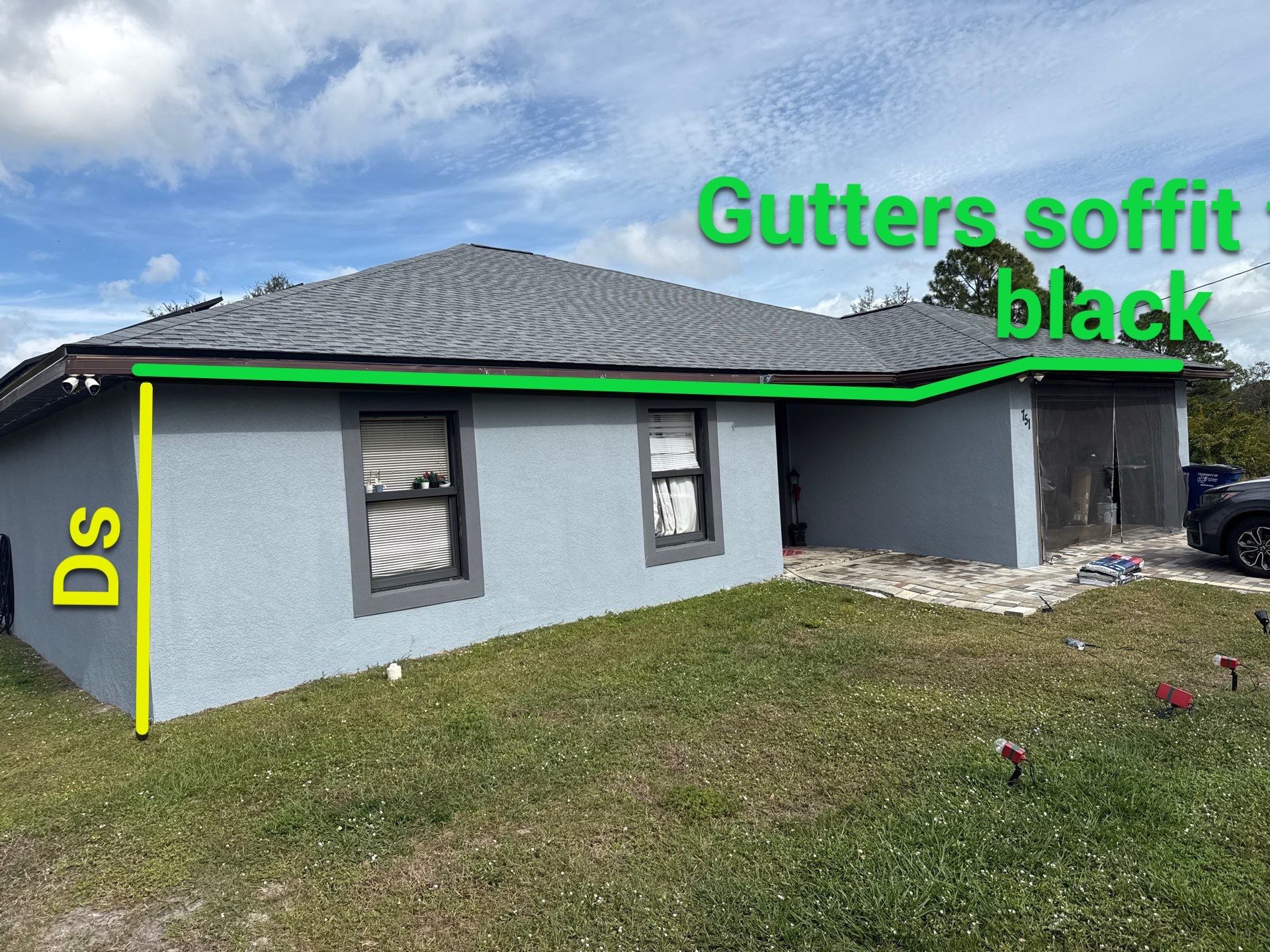 Black Seamless Gutters & Soffit/Fascia in Lehigh Acres FL by Gutter Professors