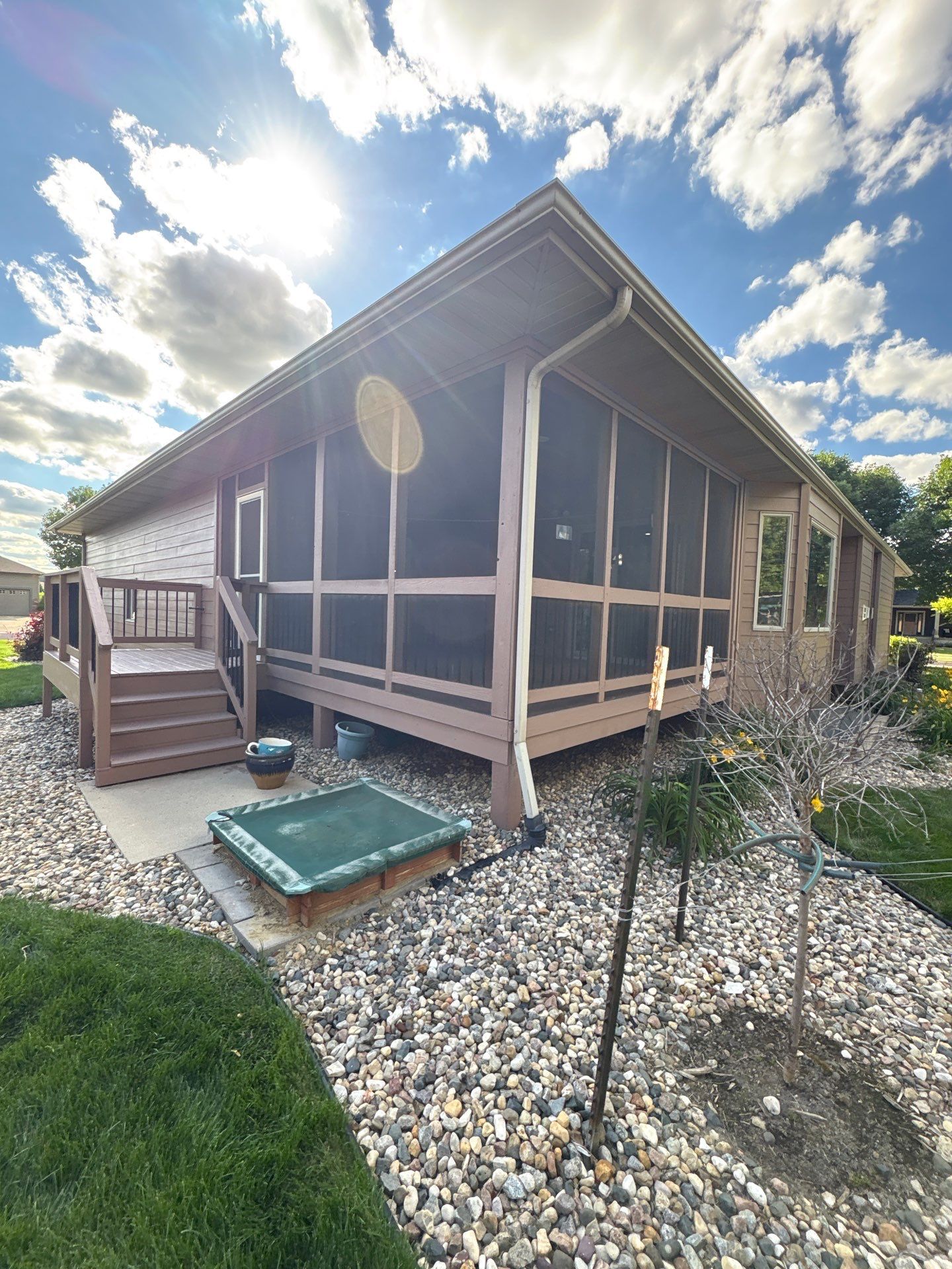 Exterior Painting and Wooden Deck Staining in Sioux Falls by Select Painting, Coatings & Garage Cabinets