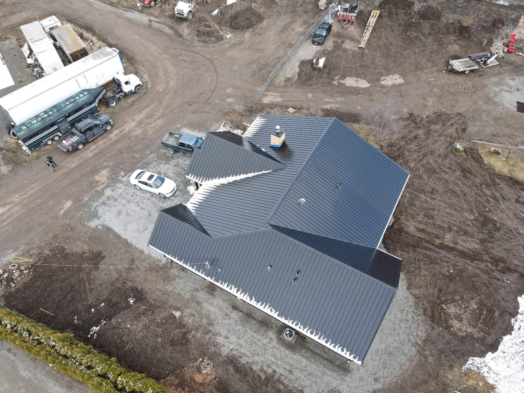 Residential Roofing Installation using 12" Prolok metal  by Top Notch Roofing Inc