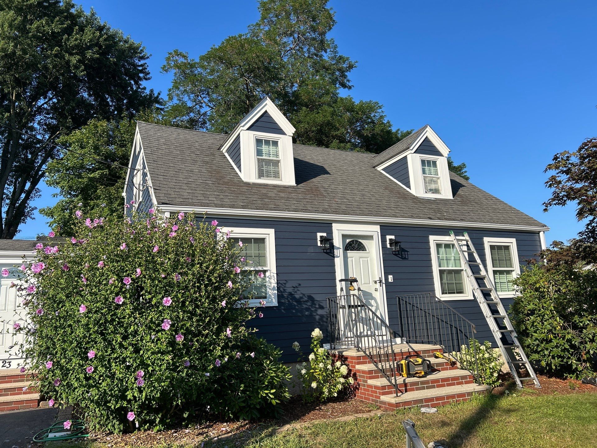 Complete Exterior Transformation - James Hardie Siding, Windows & Doors by UBrothers Construction
