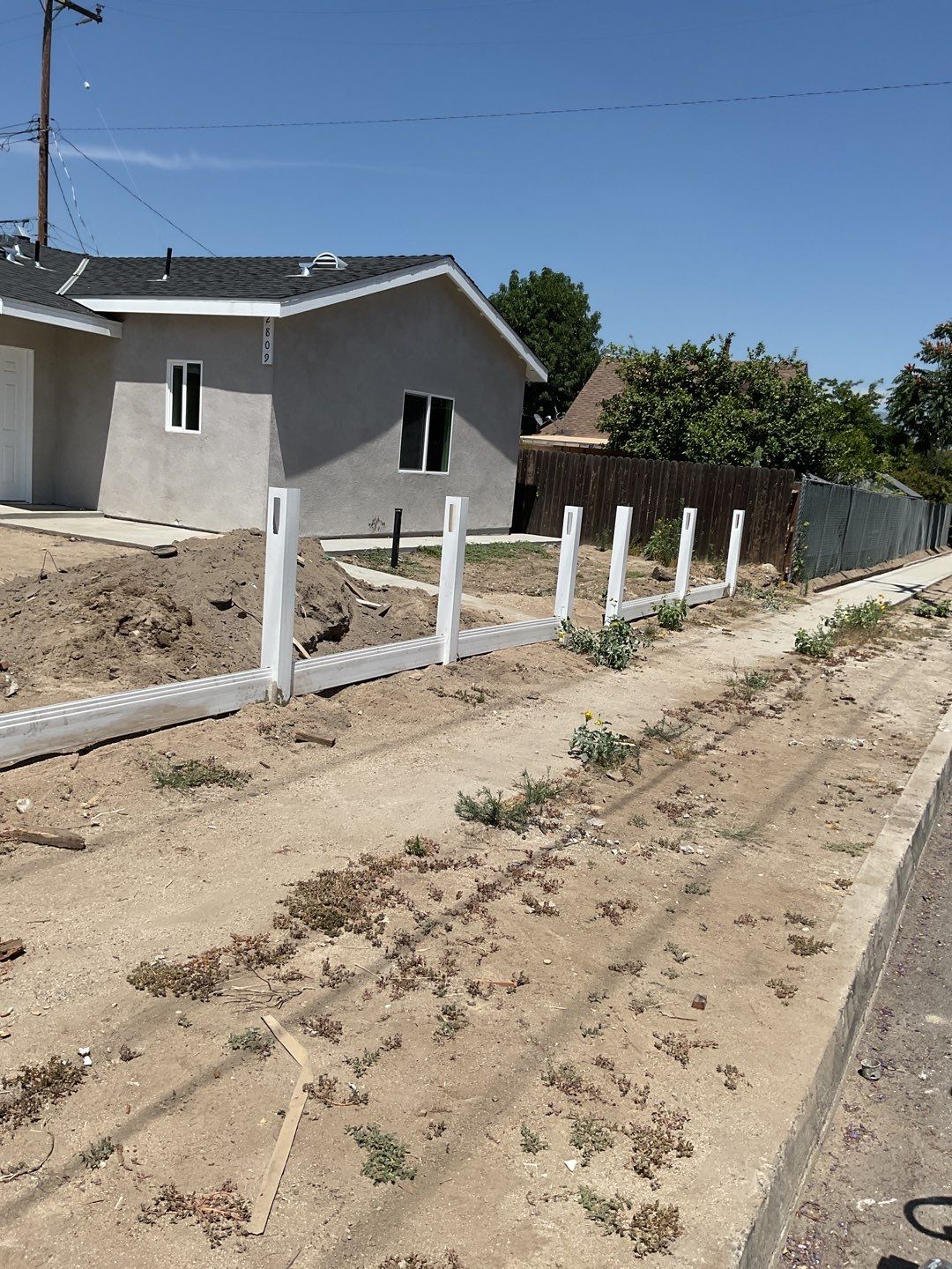 Fence installation using 6ft and 4ft vinyl  by Fence Guys Inc. 