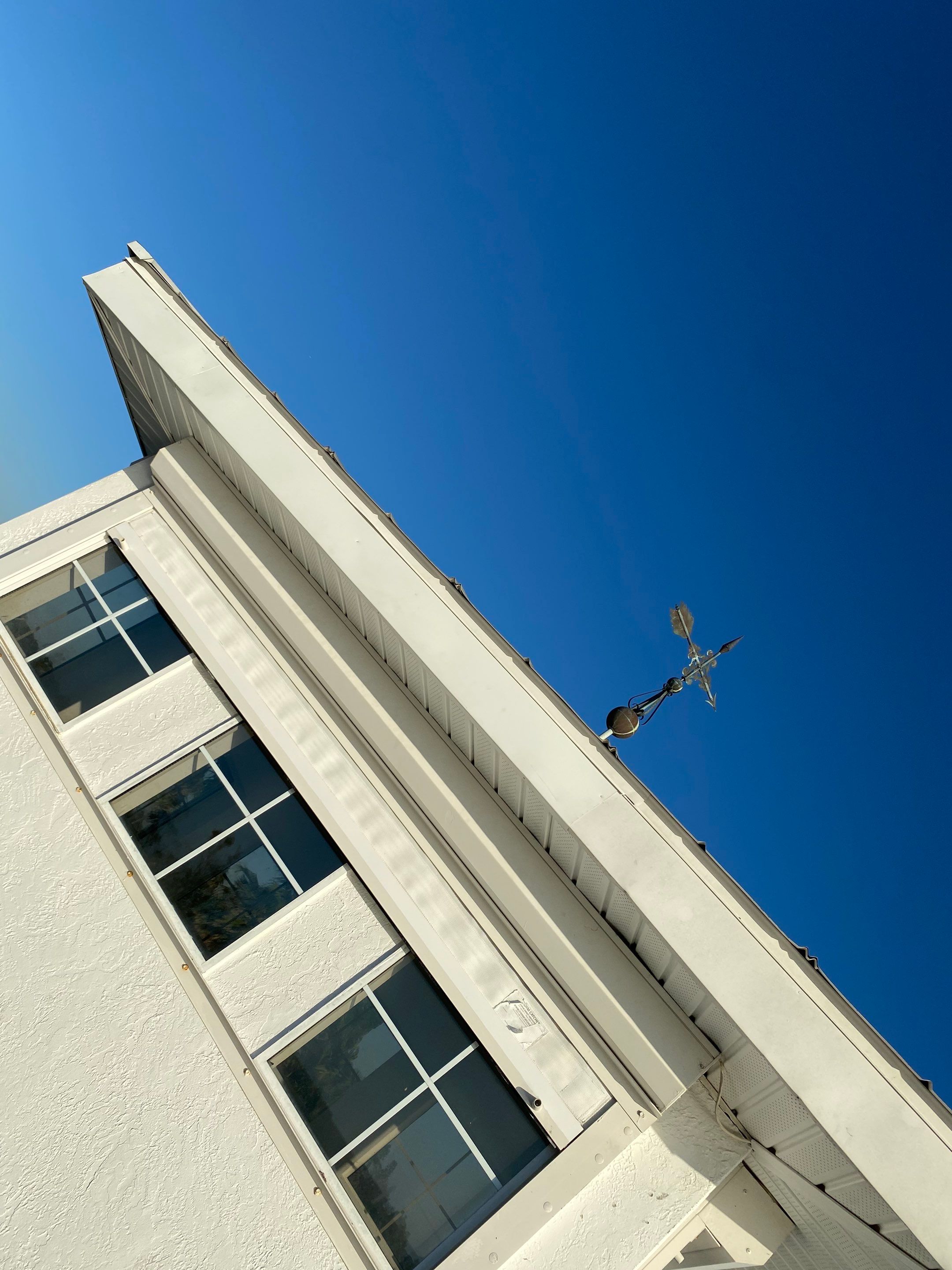 Seamless Gutter Installation for Beach Homes in Sarasota FL by Gutter Professors