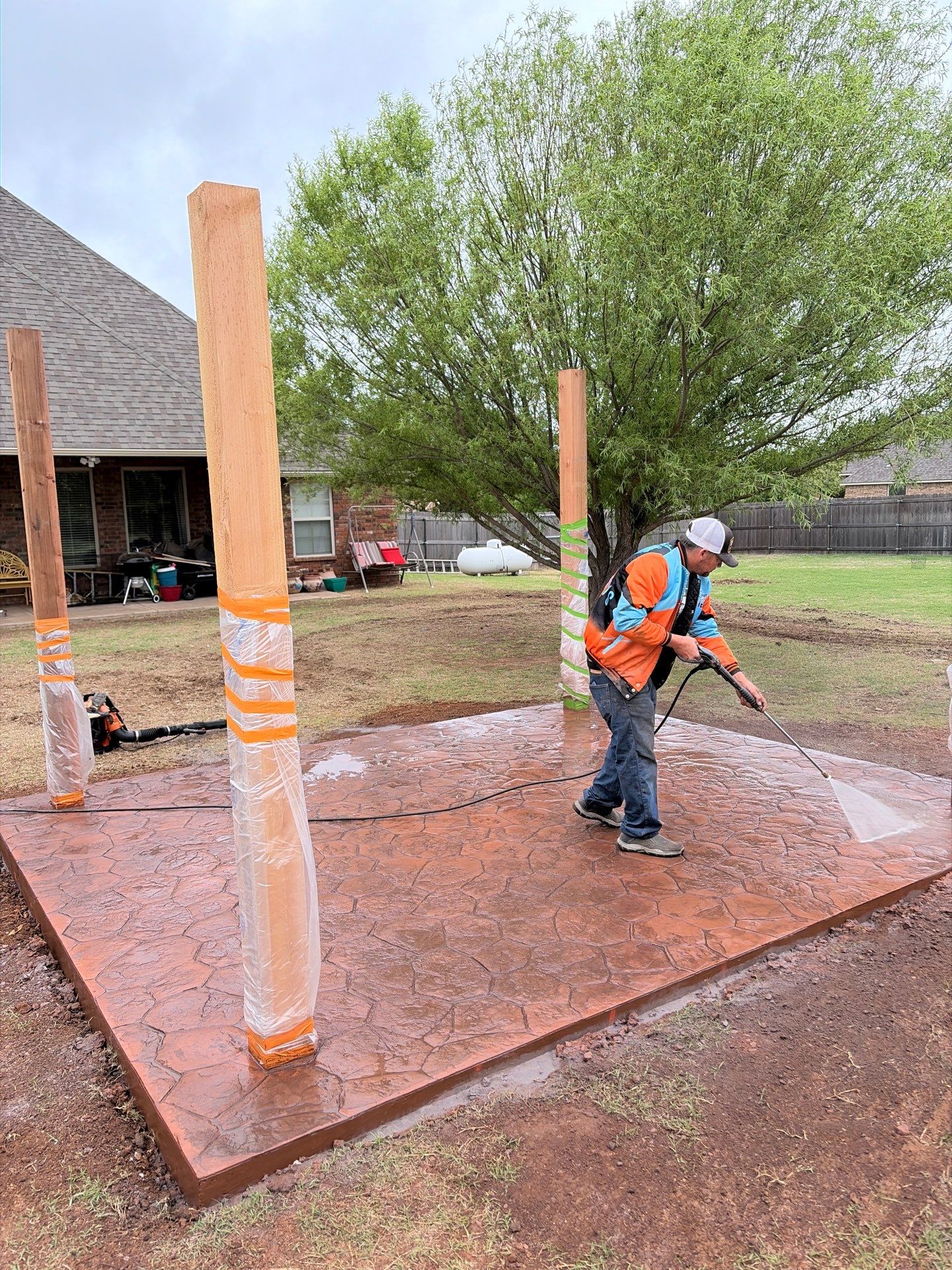 Stamped Concrete & Custom Pergola Build by Clays Services Inc