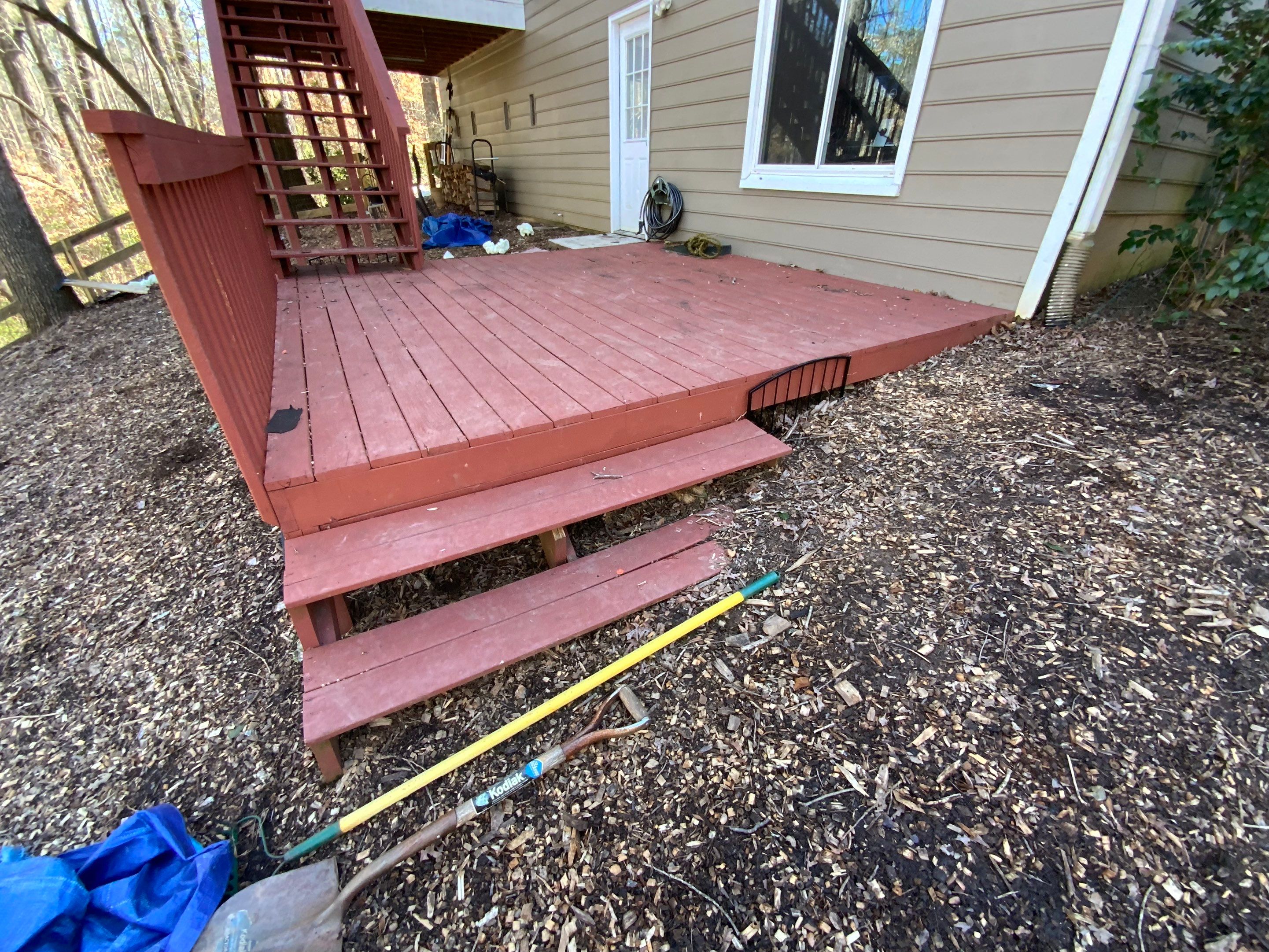 Pressure-Treated Wood Deck and Staircase Installation in Kennesaw by Swift Home Renovations 