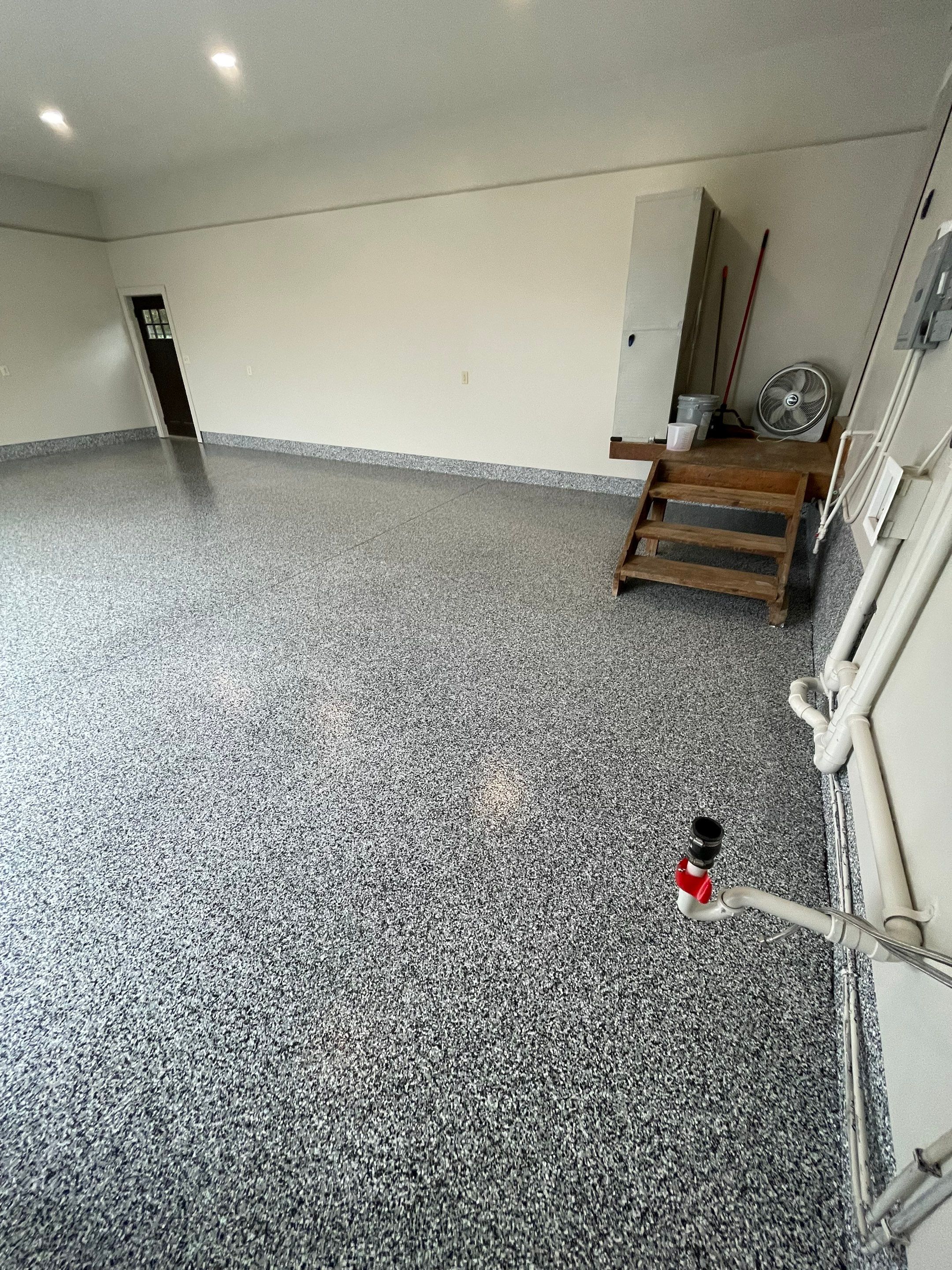 Domino Flake Floor Coating and Crack Repair in Chancellor by Select Painting, Coatings & Garage Cabinets