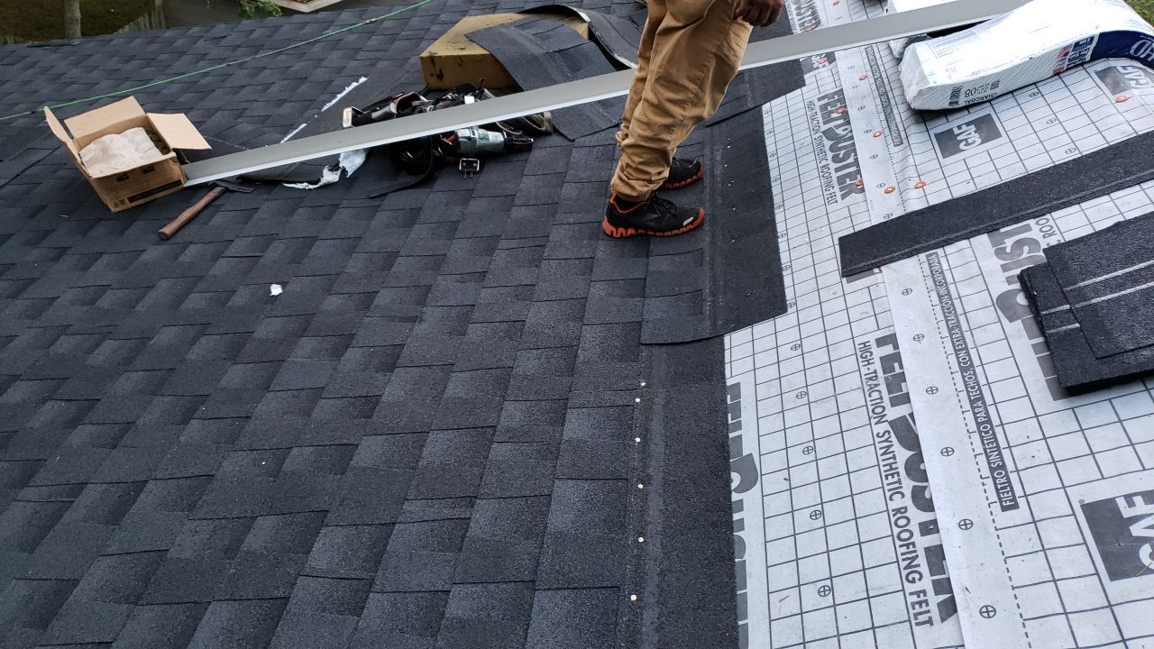 Residential Roofing Installation using Roof Replacement by American Roofing & Construction LLC
