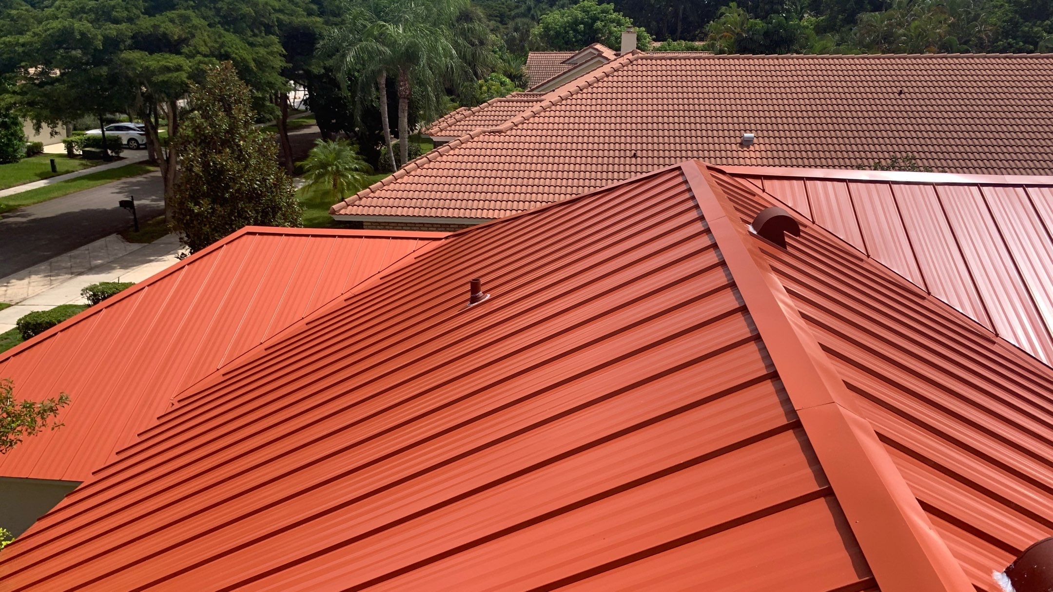 Residential Roofing Installation using 1" Nail strip metal roof by BLUES BROTHERS CONSTRUCTION CORP