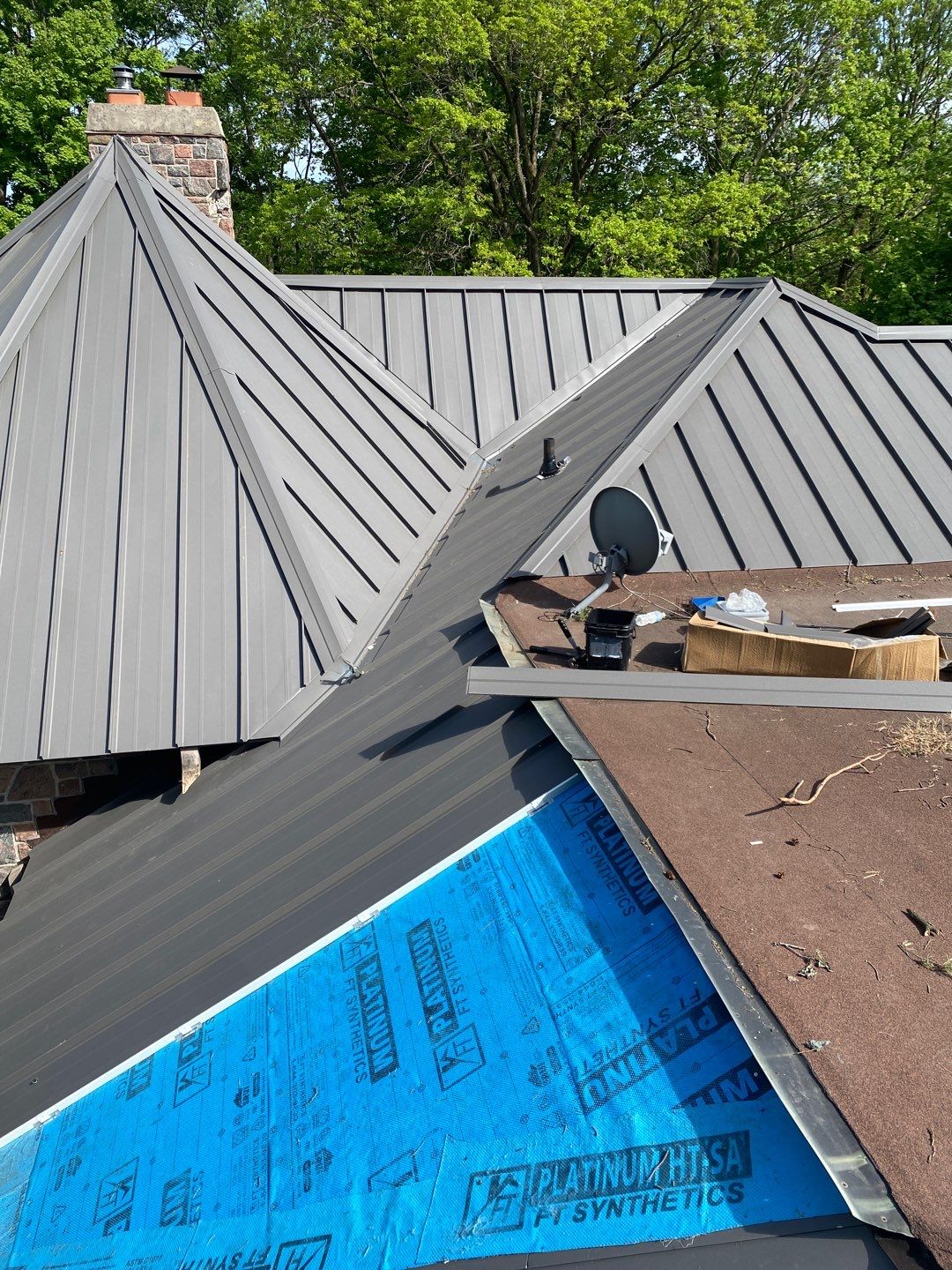New Roof Installation using 16" Standing Seam Panels by Jay Carter Roofing & Sheet Metal