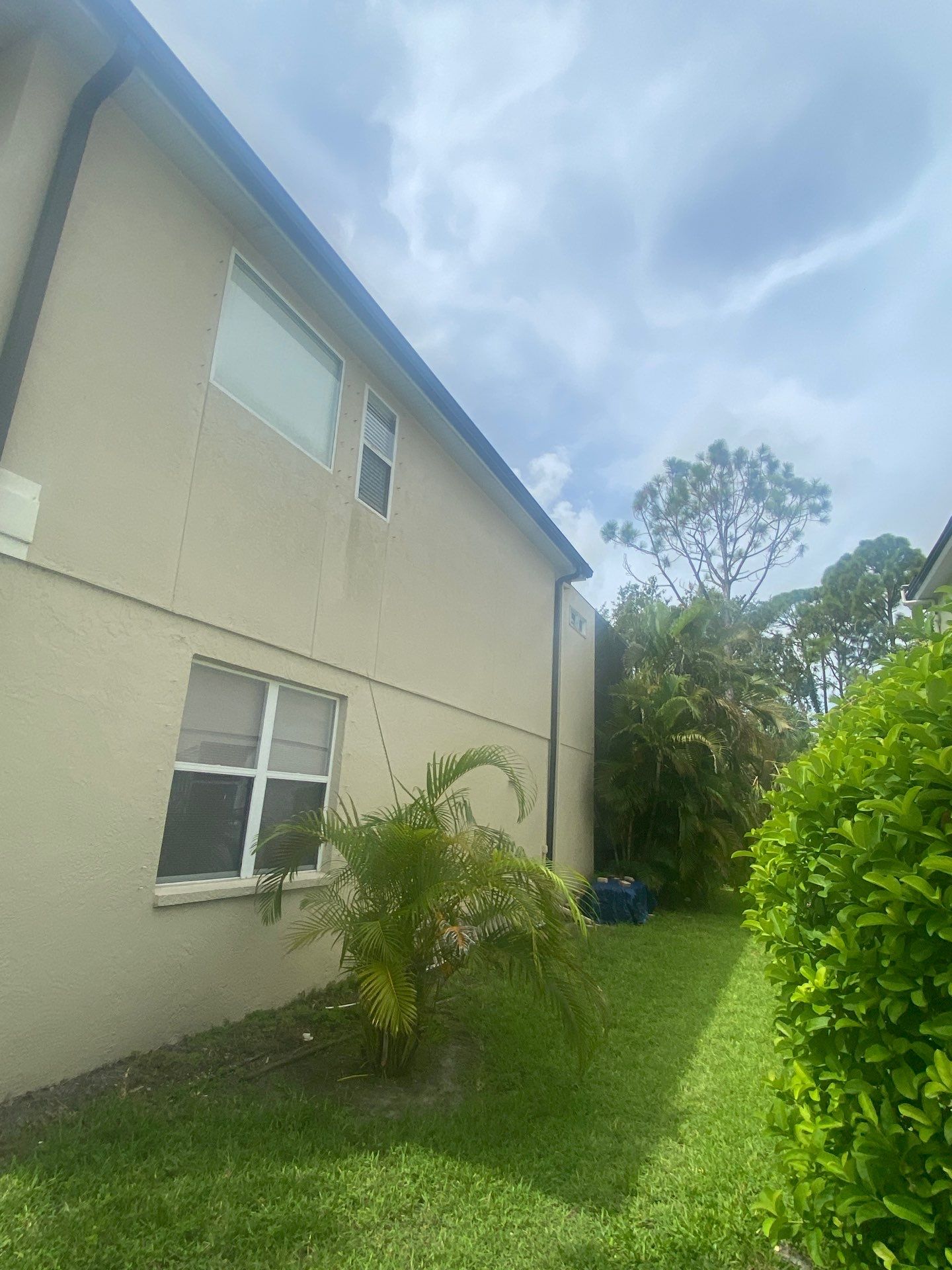 Black Seamless Gutters for Modern Homes in Osprey FL by Gutter Professors