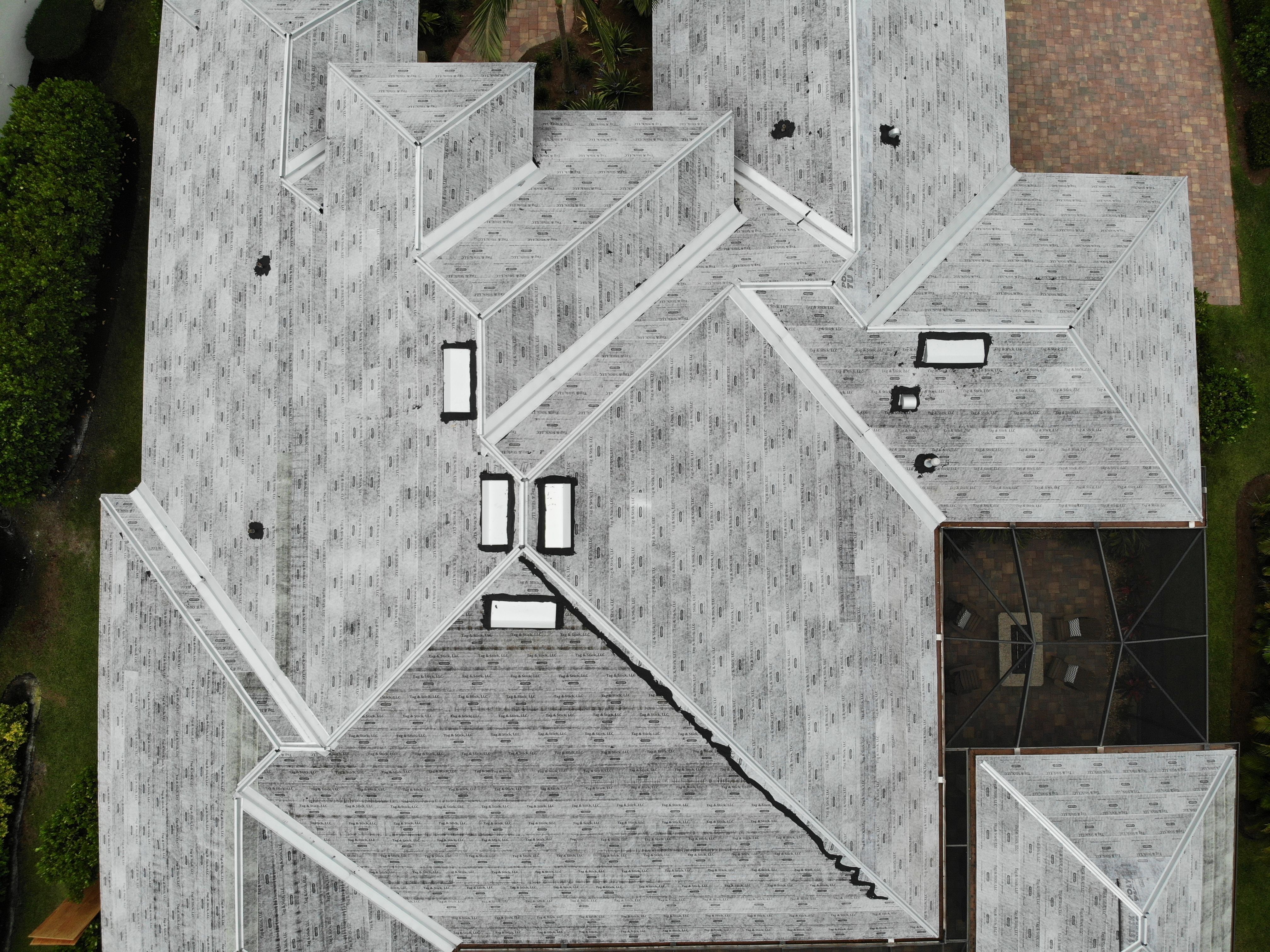 Residential Roofing Installation using Composite Spanish Tile by International Roofing