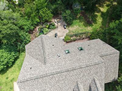 Weathered Wood Roof Replacement with Skylights in Hampstead, NC