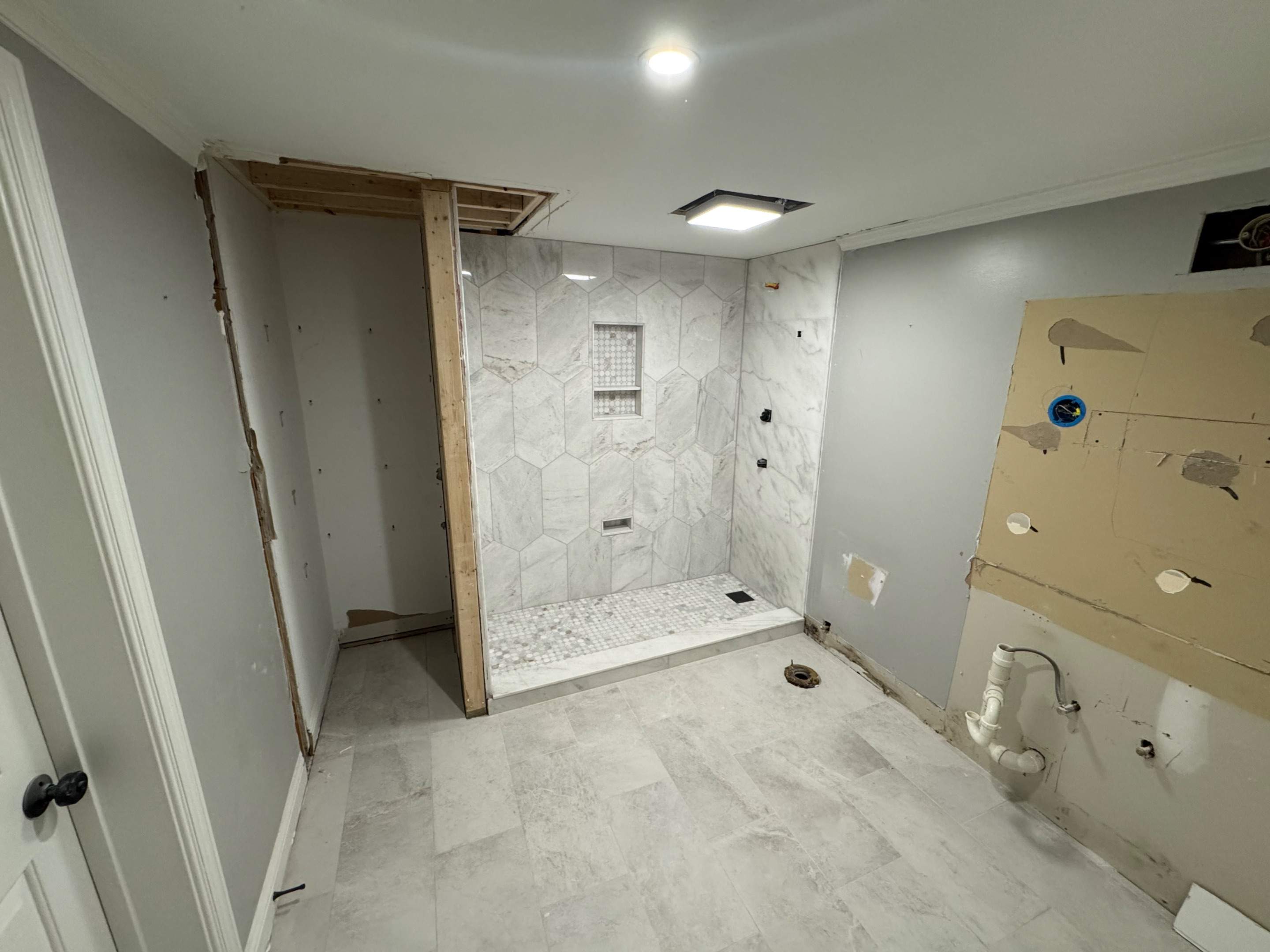Basement bathroom renovation by Prudencio