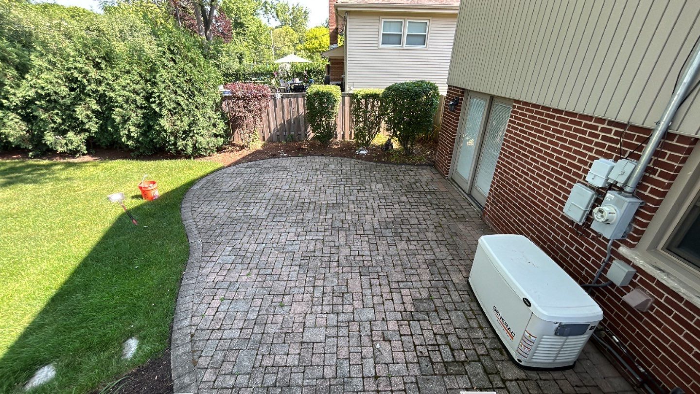 Brick paver clean, sand and seal. using Algaecide, soft wash soap by Northern Power Washing LLC.