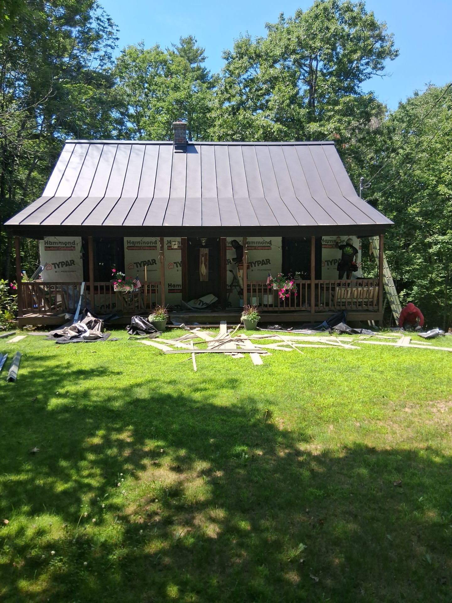 Sage Green Board and Batten Siding and Deck Upgrade in Standish by Tall pine roofing
