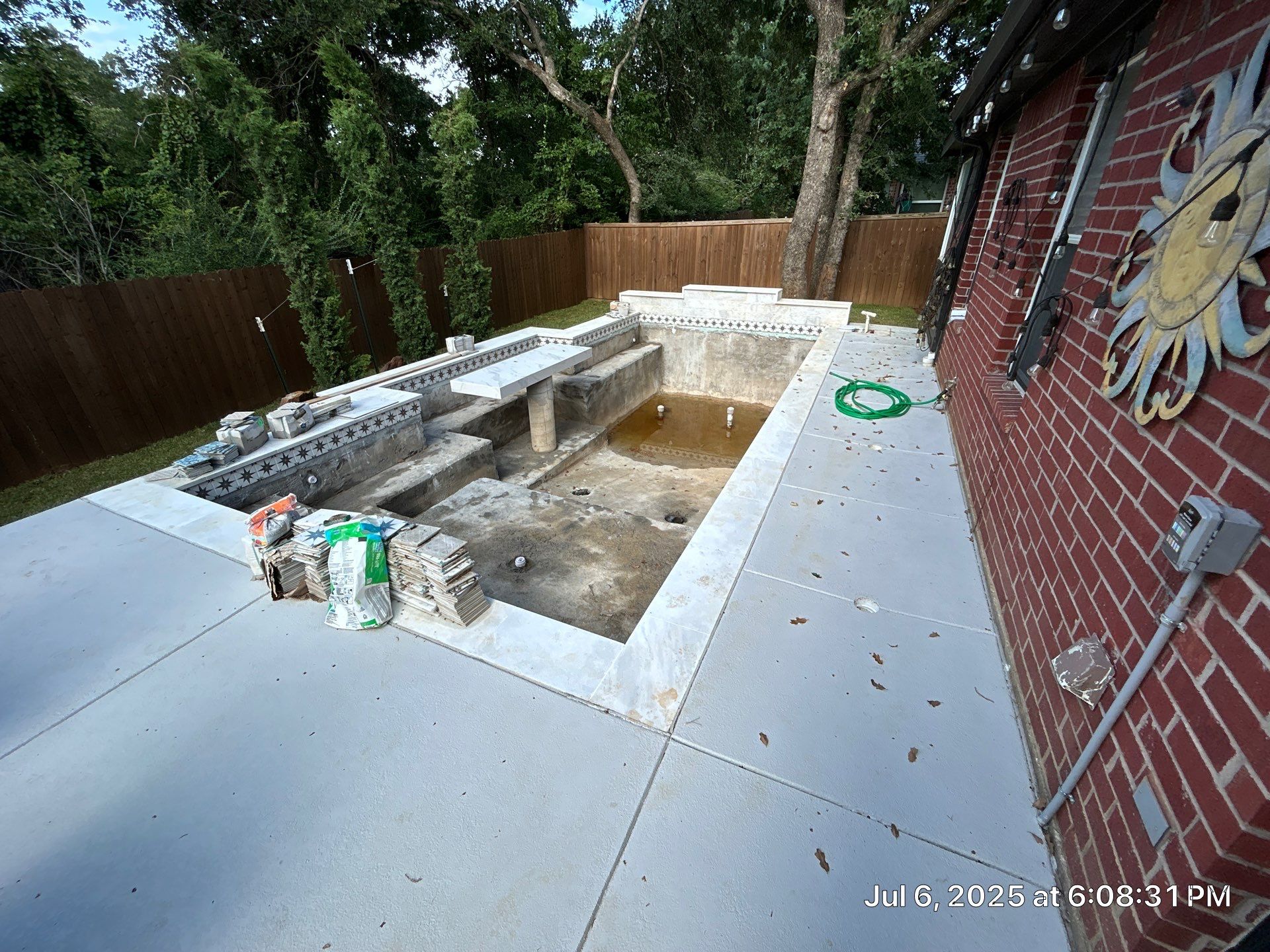 Geometric Pool with Raised Spa and White Coping by Pinnacle Pools and Spas - DFW