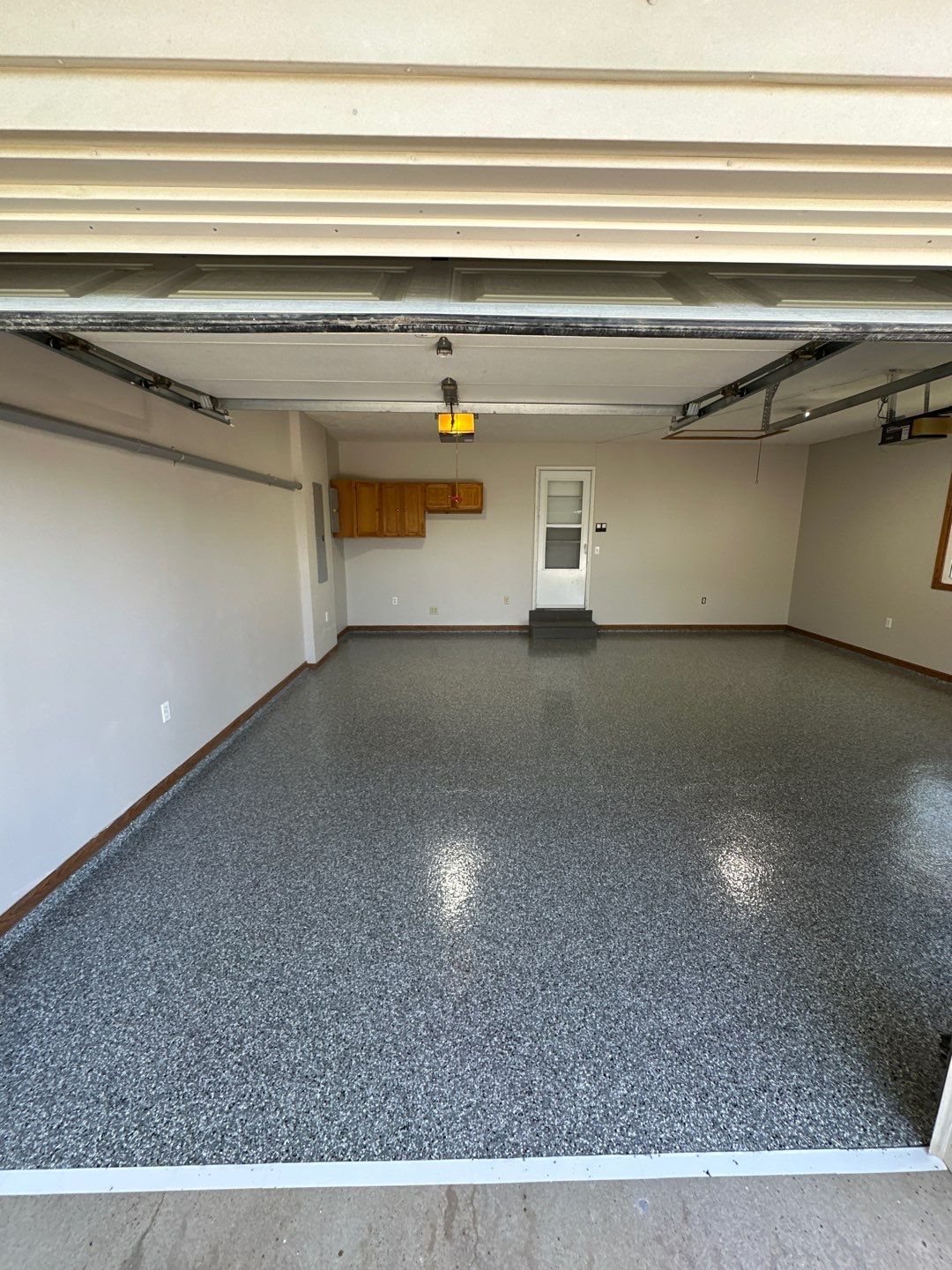 Epoxy Garage Floor Transformation and Concrete Repair in Beatrice by Goat Coatings