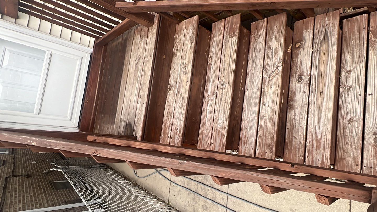 Wood cleaning and staining using Armstrong cloark oil stain by Northern Power Washing LLC.