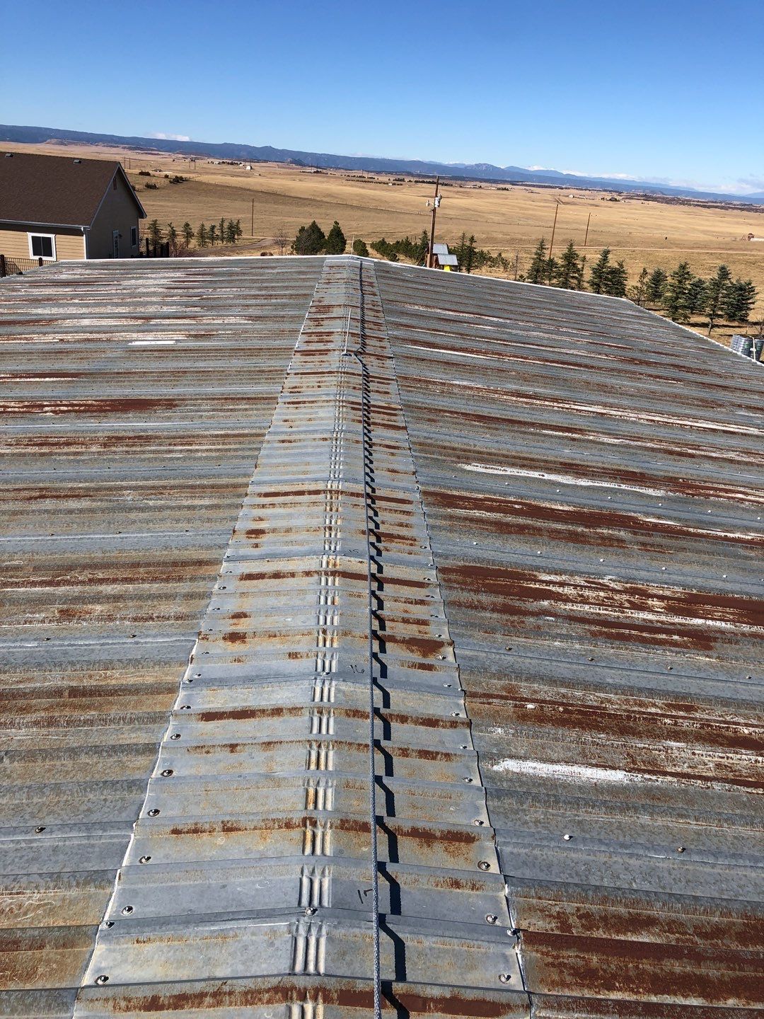 Residential Roofing Installation using Metal roofing by American Roofing & Construction LLC
