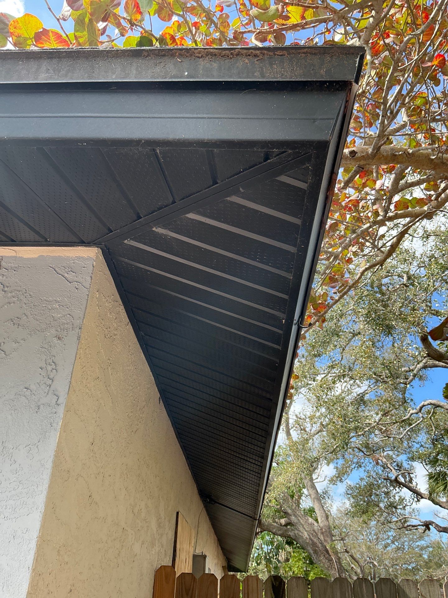 Gutter Repair Service in Sarasota FL - Black Soffit by Gutter Professors