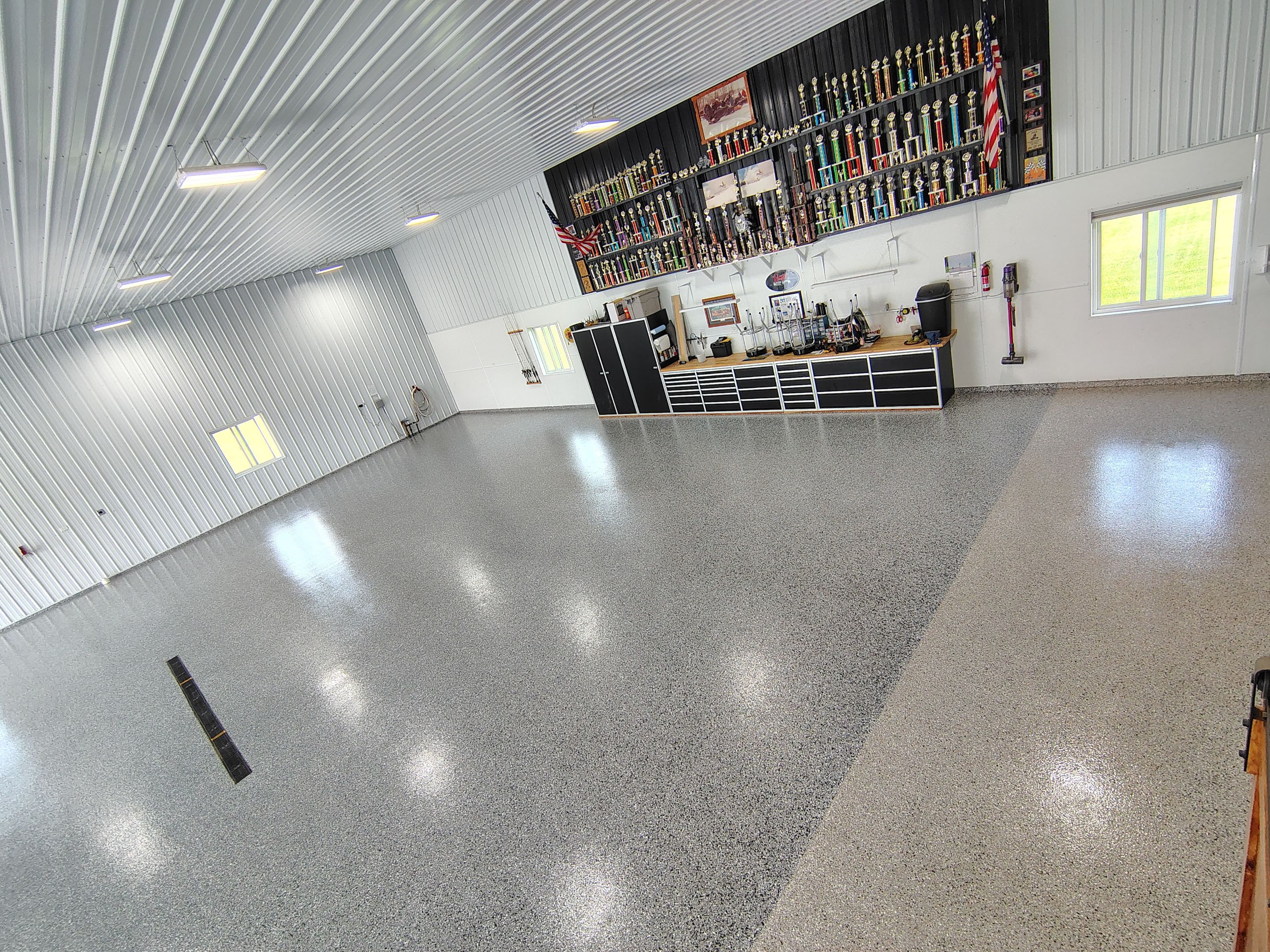 Multi-Stage Concrete Floor Coating for Egan Shop and RV Storage by Select Painting, Coatings & Garage Cabinets