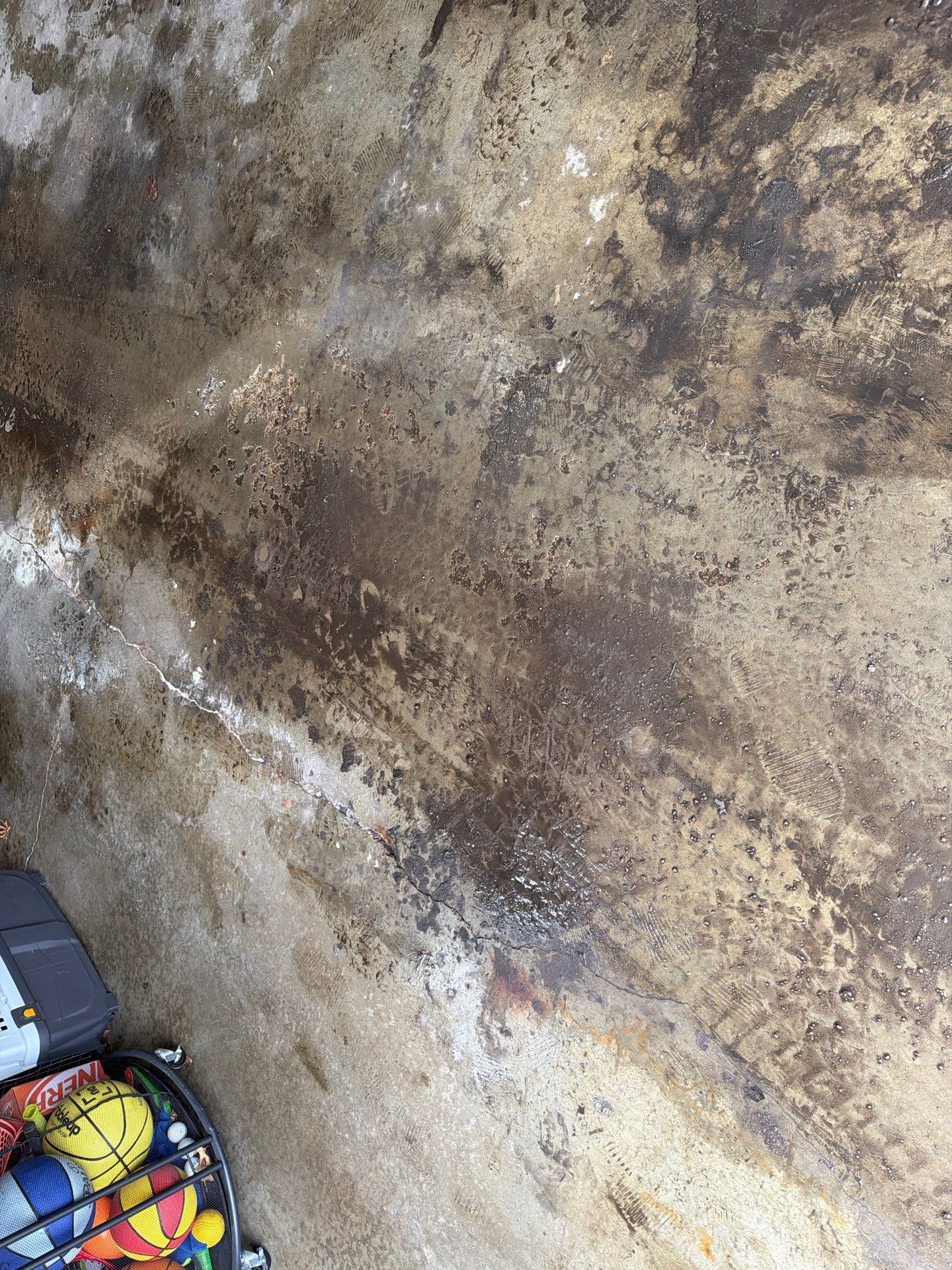 Garage Floor Concrete Coating and Crack Repair in Sioux Falls by Select Painting, Coatings & Garage Cabinets
