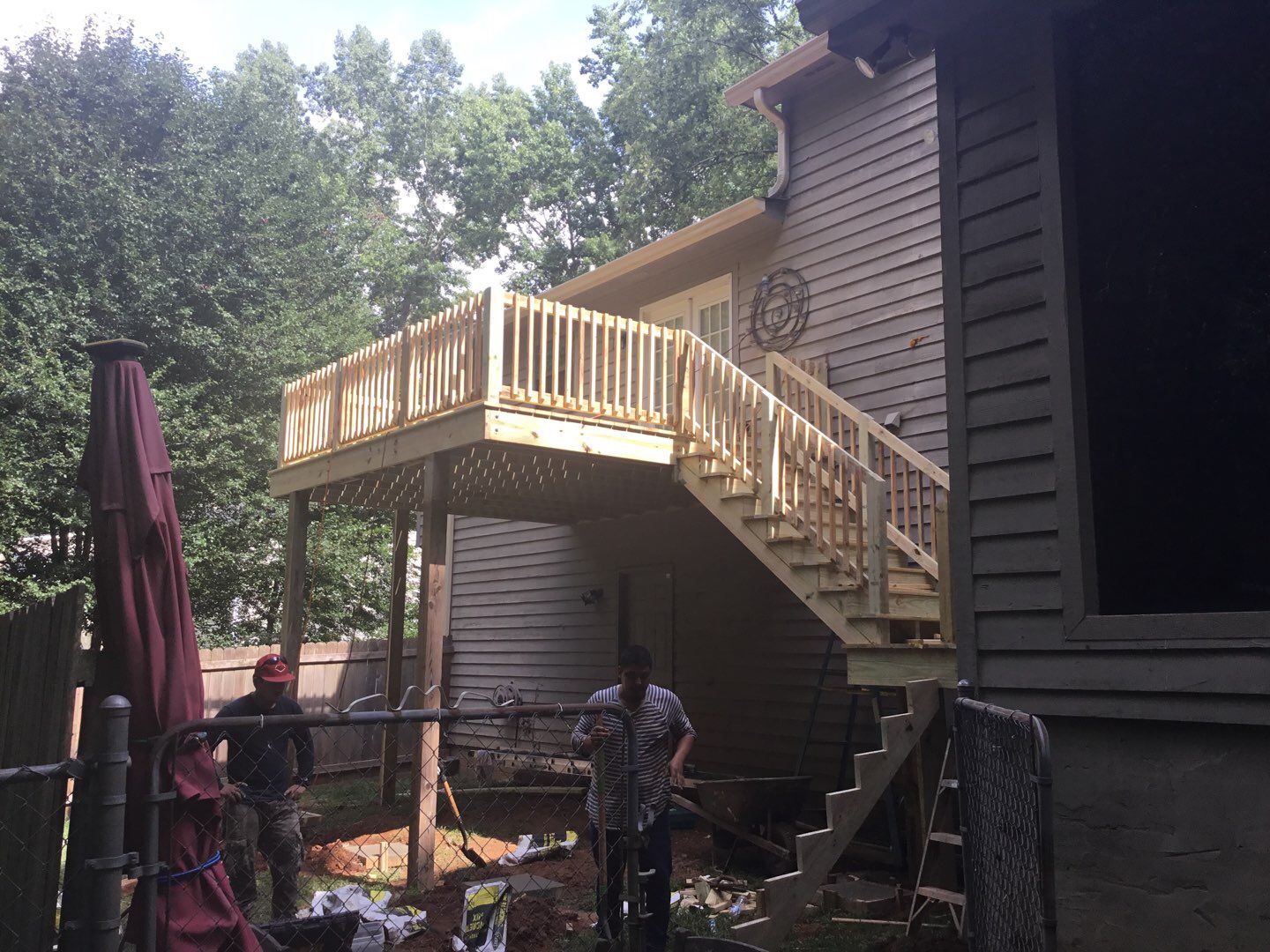 Elevated Wooden Deck and Front Porch Renovation in Marietta by Swift Home Renovations 