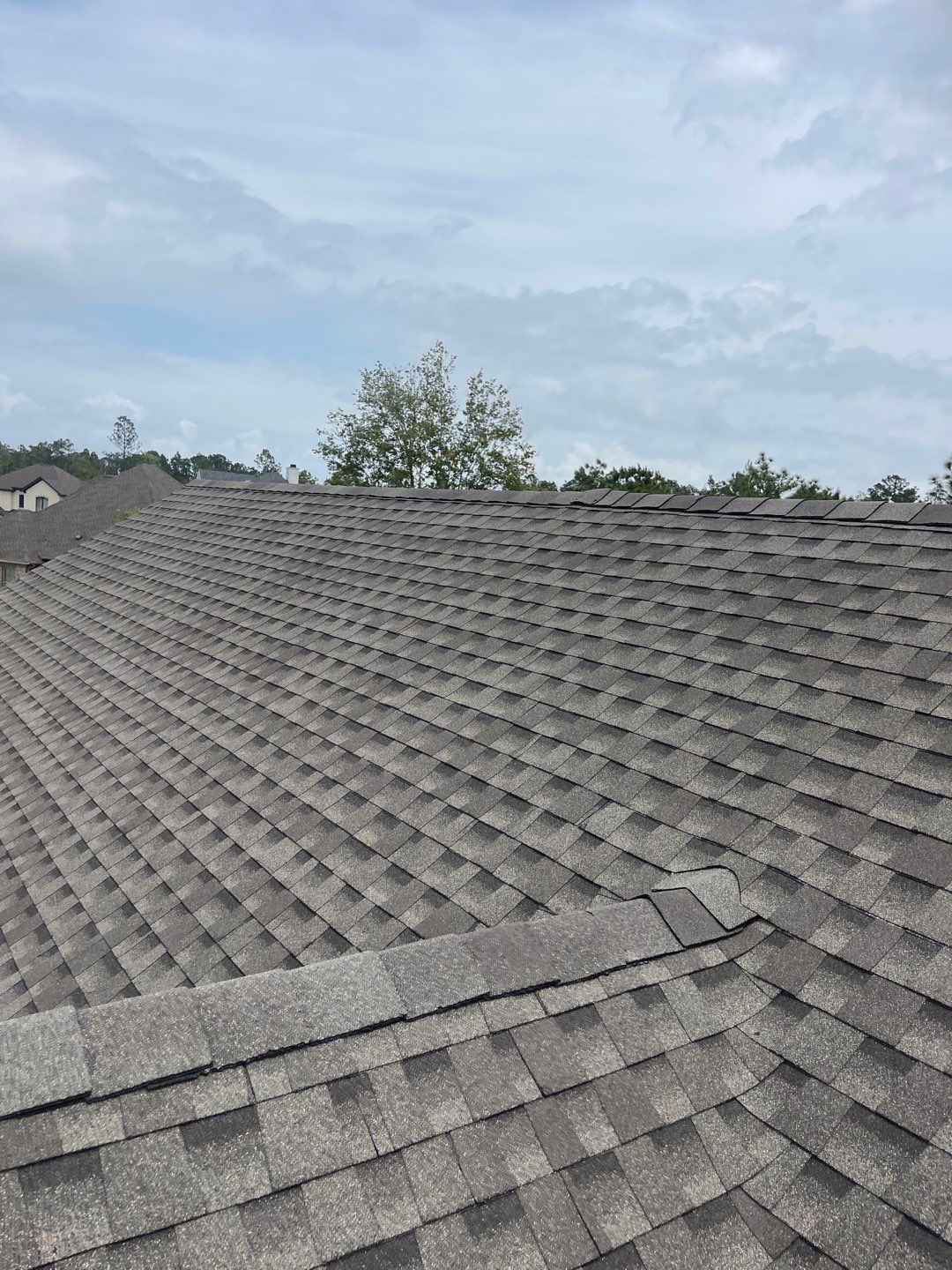 Residential Roofing Installation using Roof Replacement by American Roofing & Construction LLC