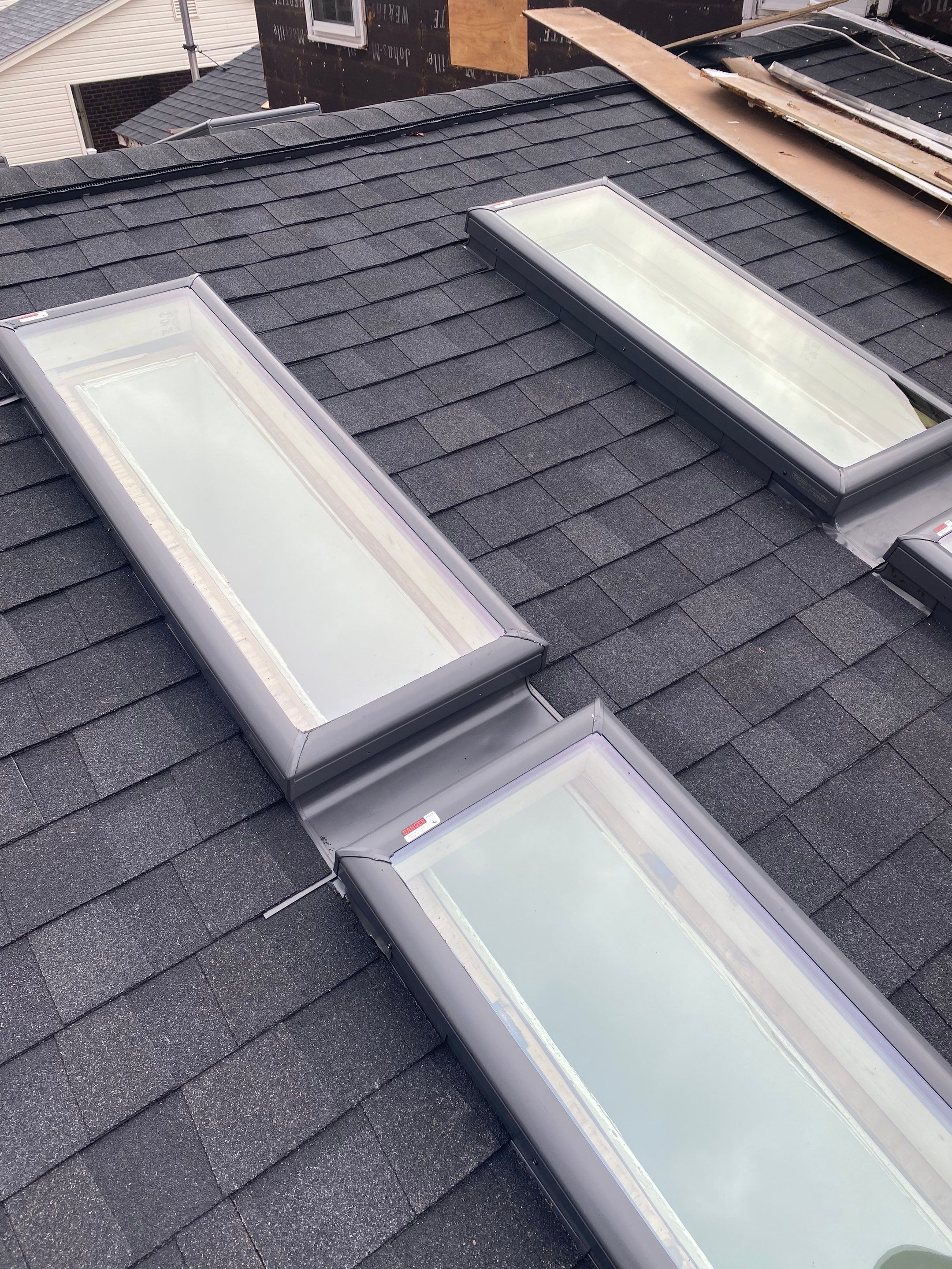 Springfield CertainTeed Charcoal Black Roof & CertainTeed Colonial White Siding by RM Banning, Inc.