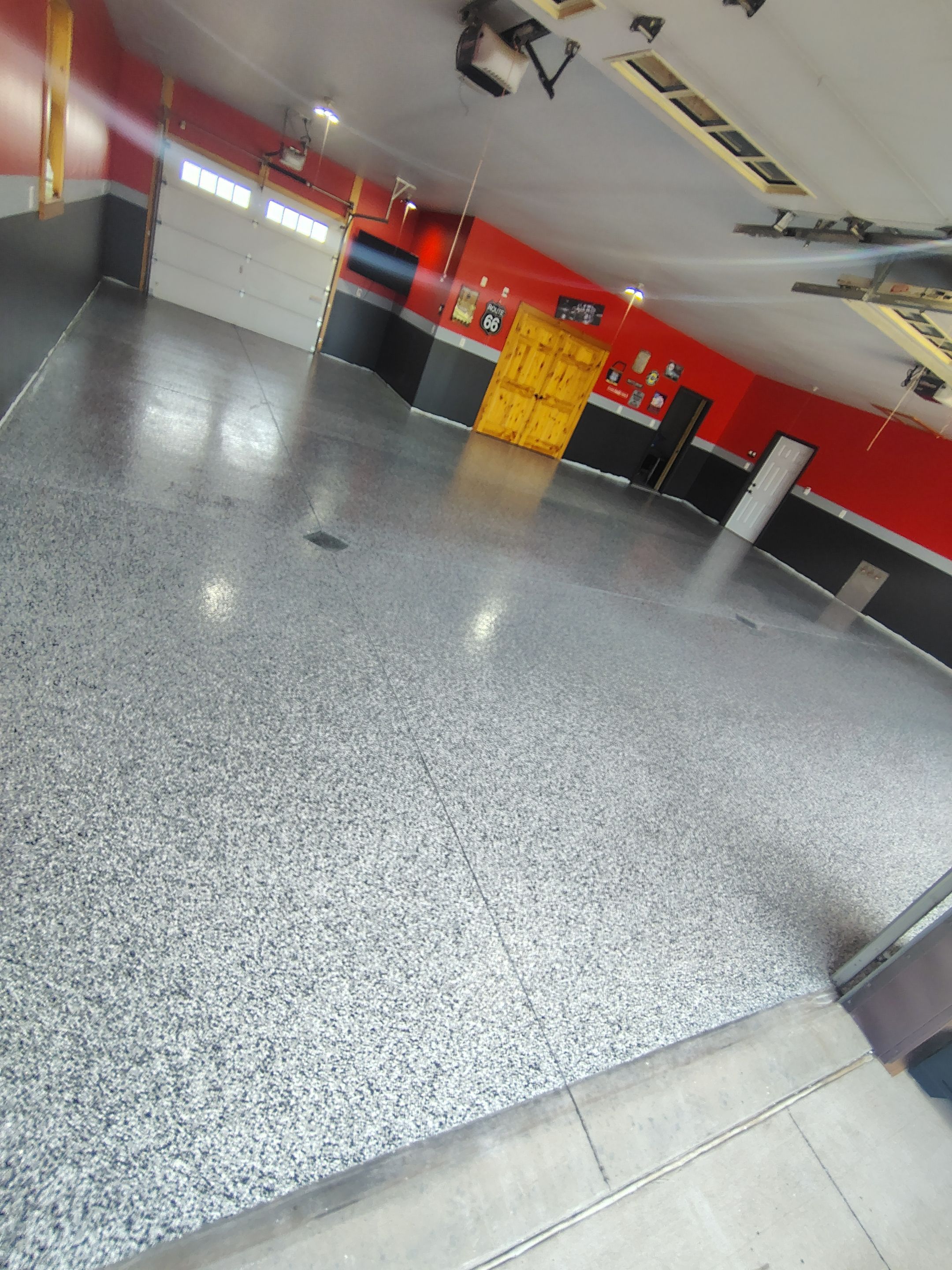 Multi-Car Garage Concrete Coating and Floor Refinishing in Hull by Select Painting, Coatings & Garage Cabinets