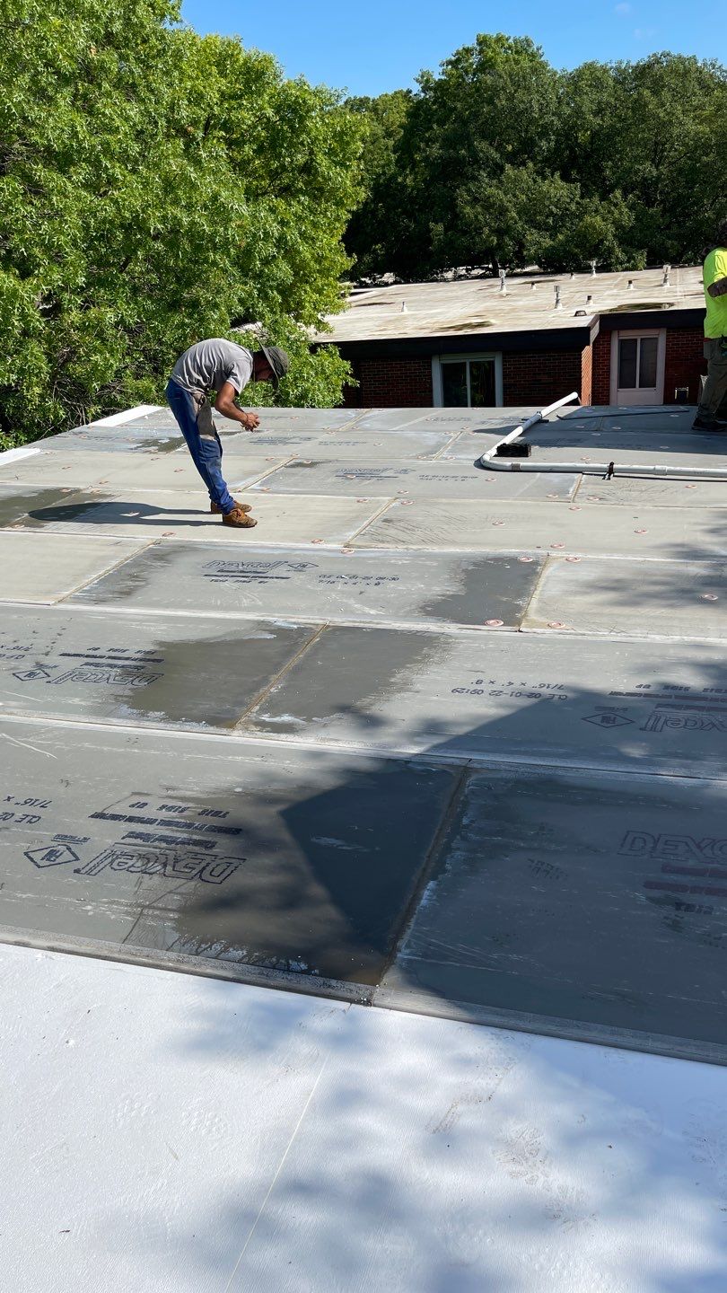 Commercial Flat Roofing System - PVC Membrane & Fluid Applied Coatings  by Titan Commercial & Residential Roofing 