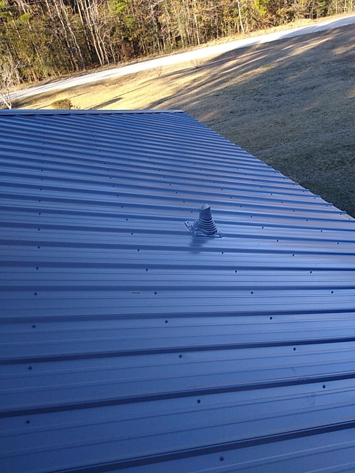 Residential Roofing Installation using Roof Replacement by American Roofing & Construction LLC