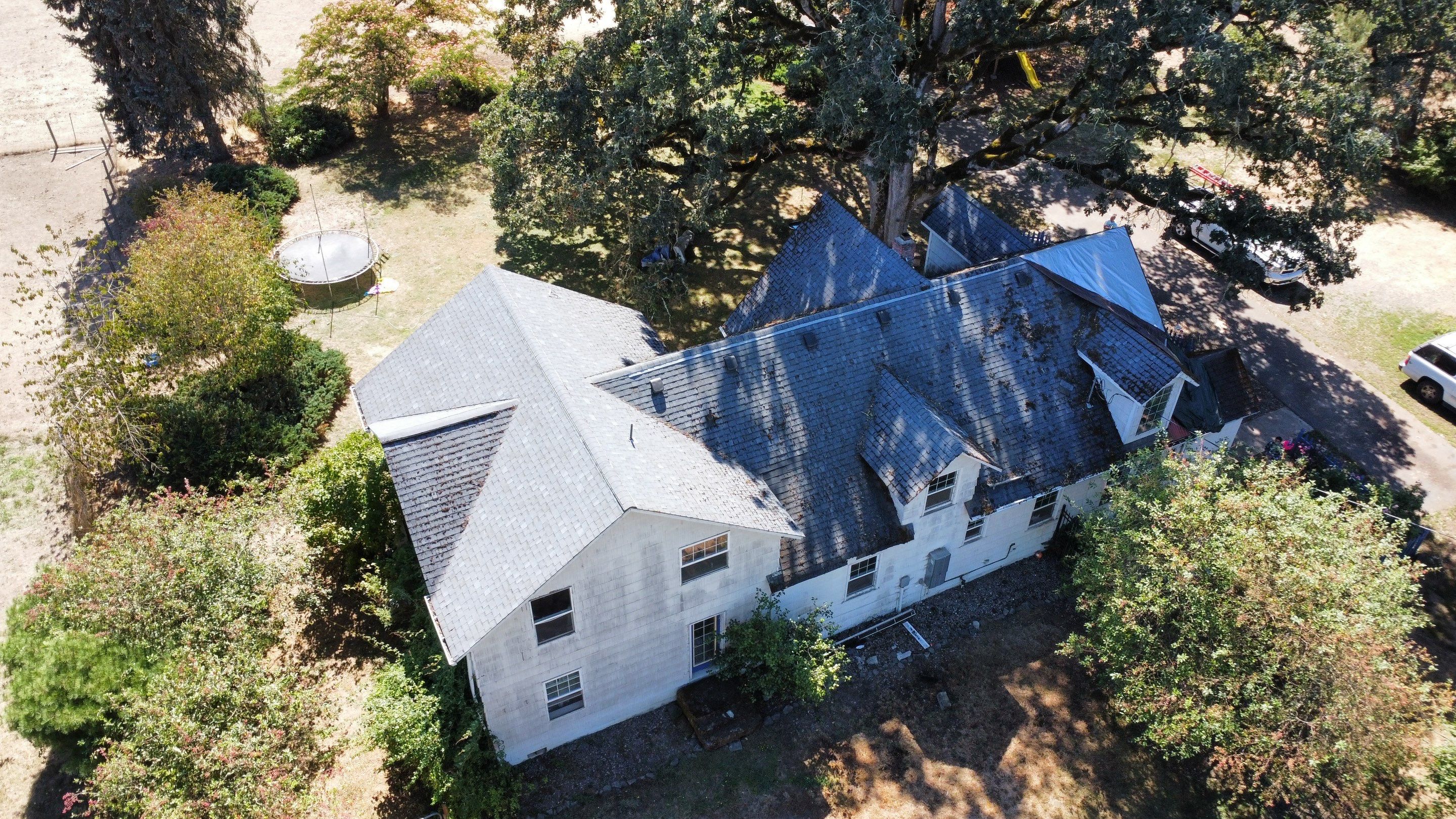 Residential Roofing Installation using IKO Dynasty (Color: Granite Black) by Orezona Building & Roofing Company, Inc.