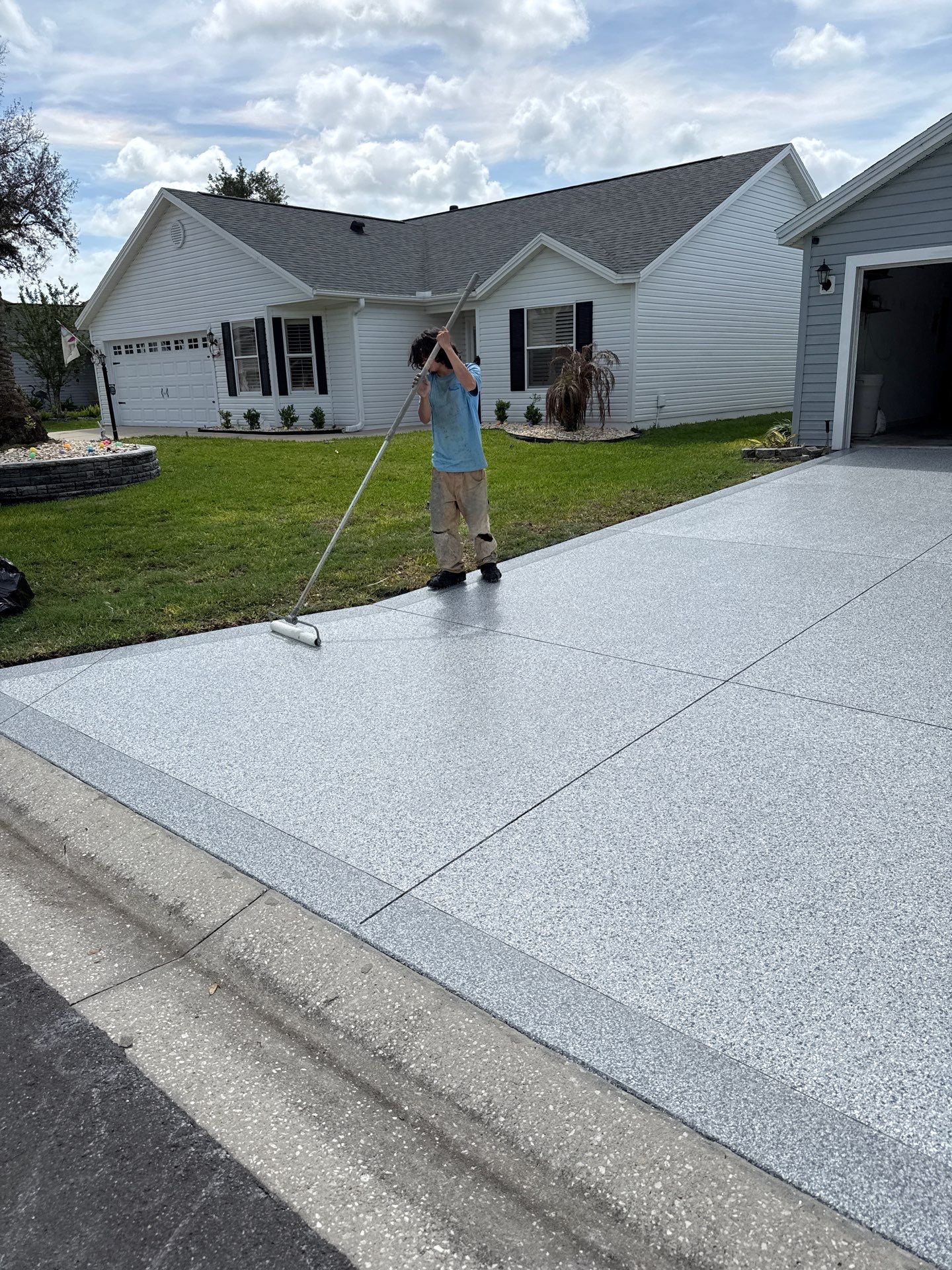 Driveway Tidal Wave with Cool Breeze Border and Sidewalk by Innovative Concrete Coatings 