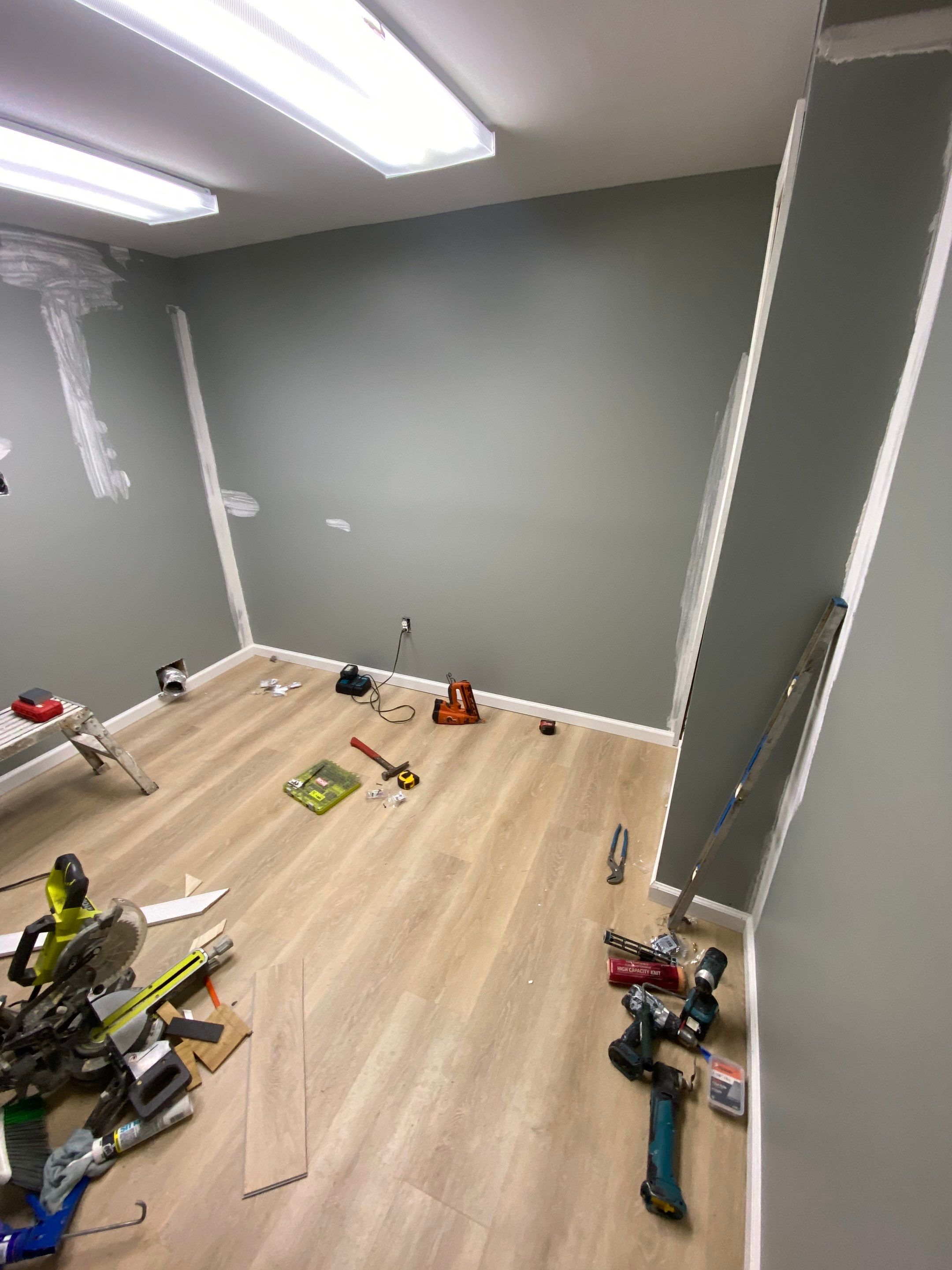 Laundry Room Redmodel using Lifeproof Luxury Vinyl Plank Flooring by The Smet Companies, LLC