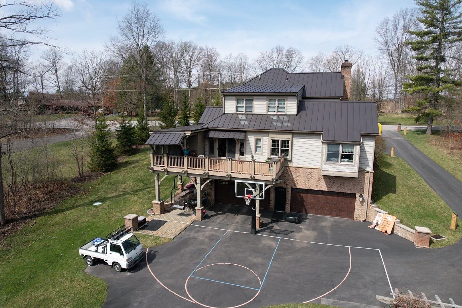 Metal Roof Replacement  by American Home Contractors