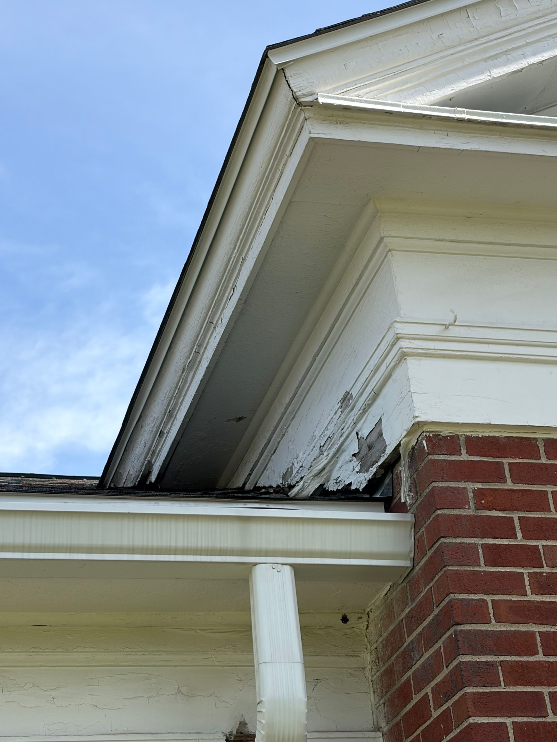 Commercial Wood Trim Restoration and Gutter Replacement in Birmingham by Top Shelf Painter