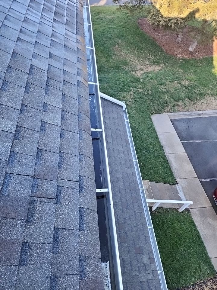 Gutter Cleaning using water by Power Wash Masters LLC